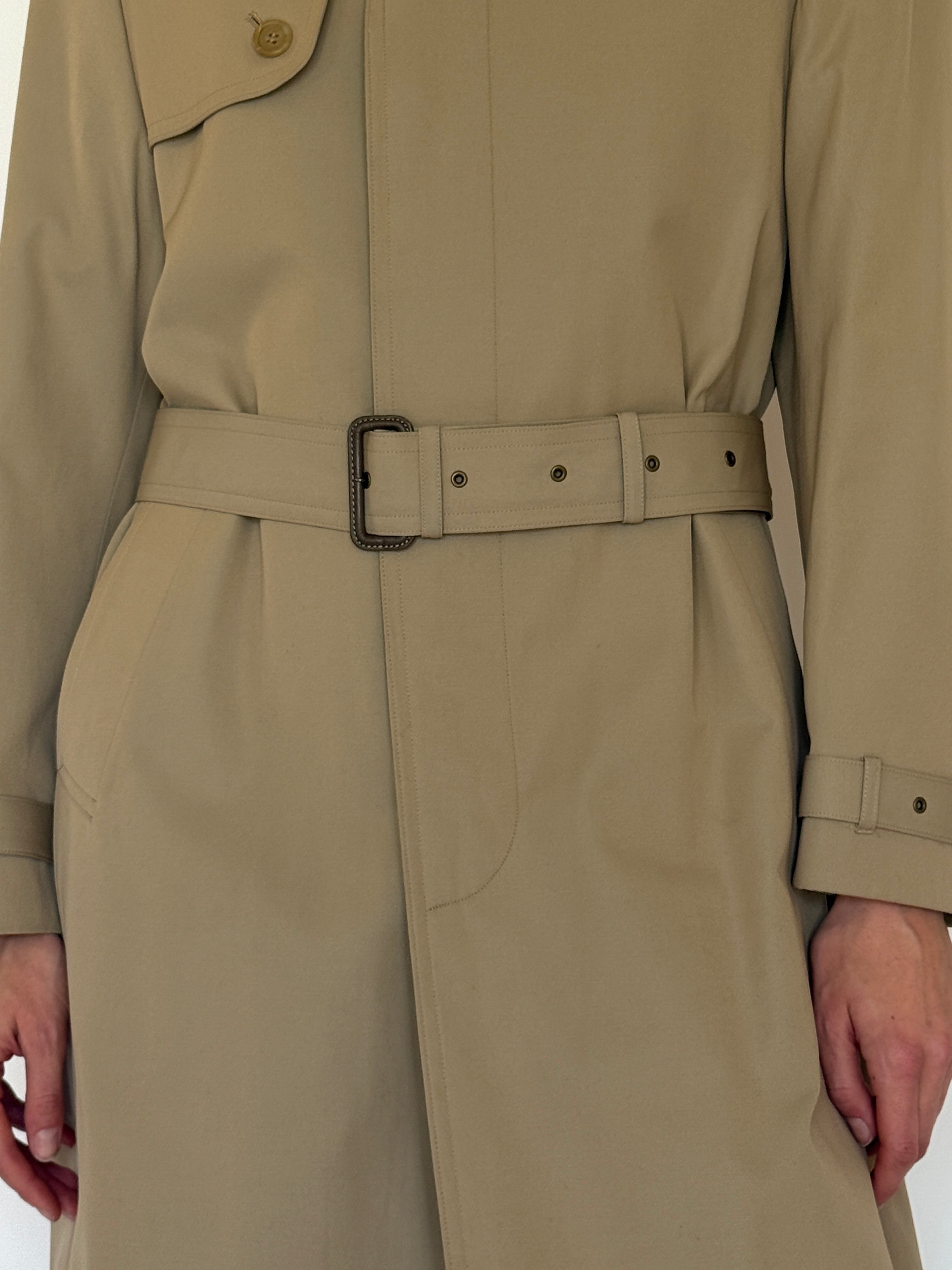 Vintage beige trench coat cuff strap and buckle detail