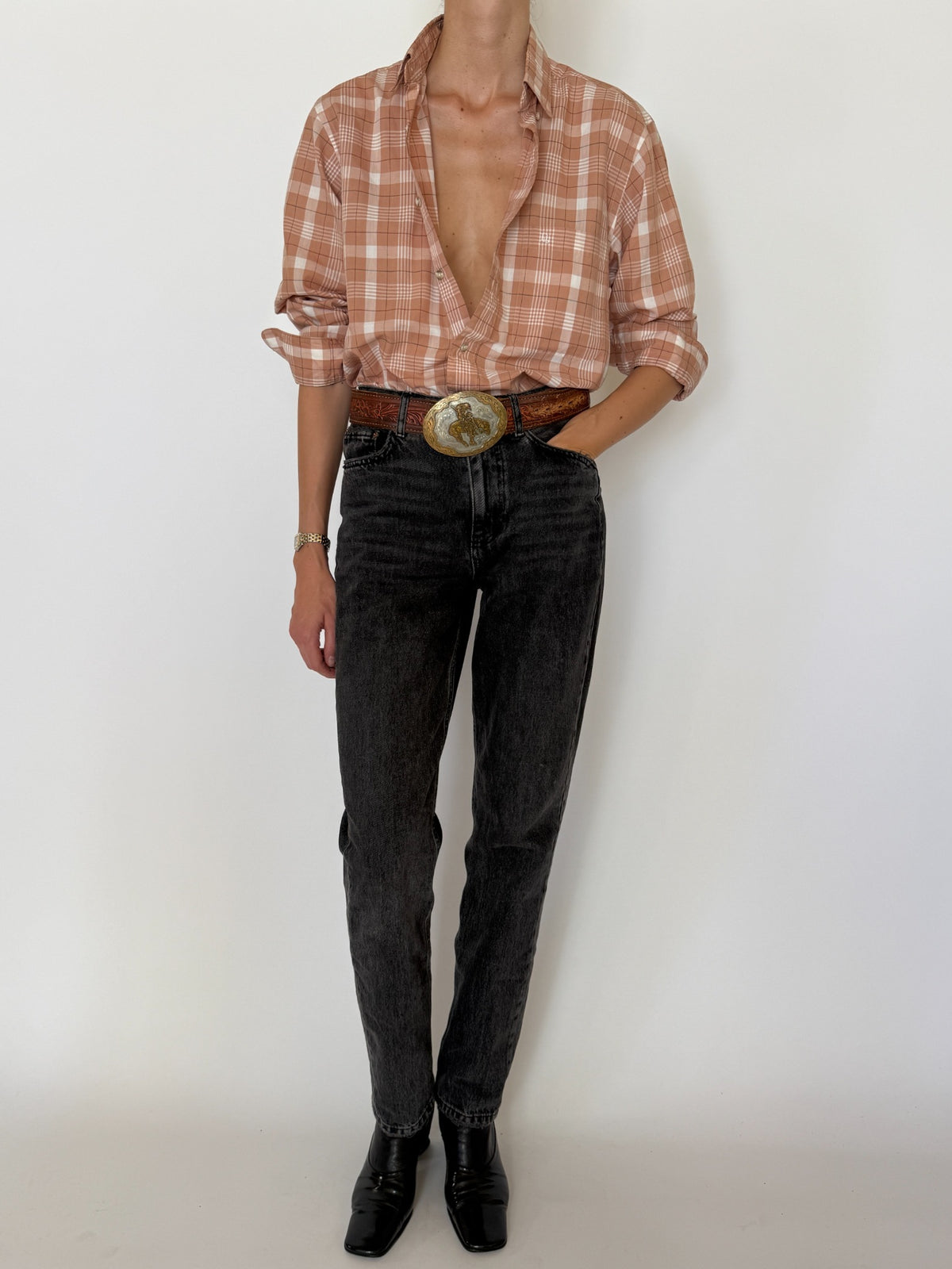 Front view Christian Dior plaid shirt styled with western belt