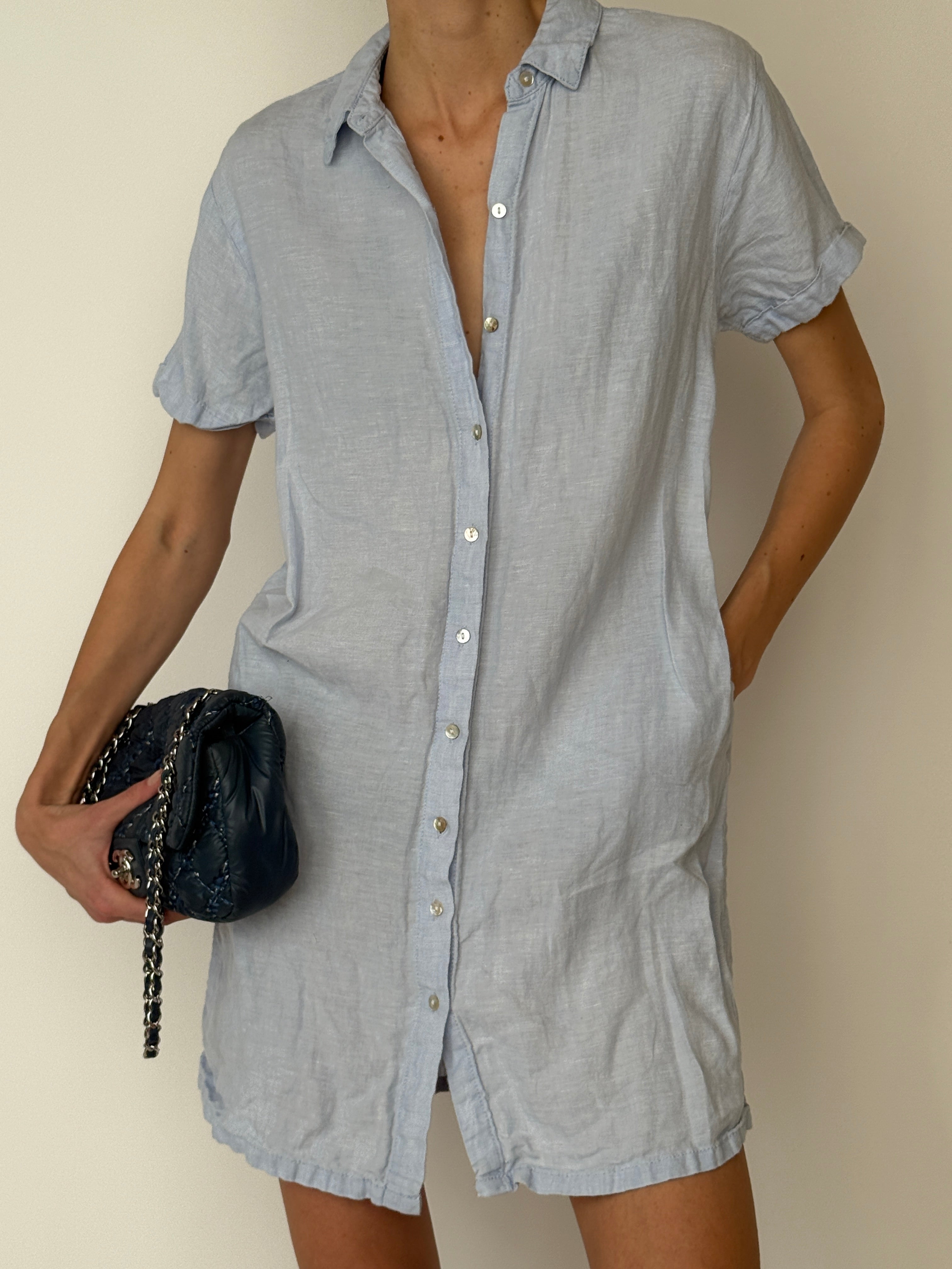 Vintage lightweight linen shirt dress with relaxed silhouette in light blue close-up