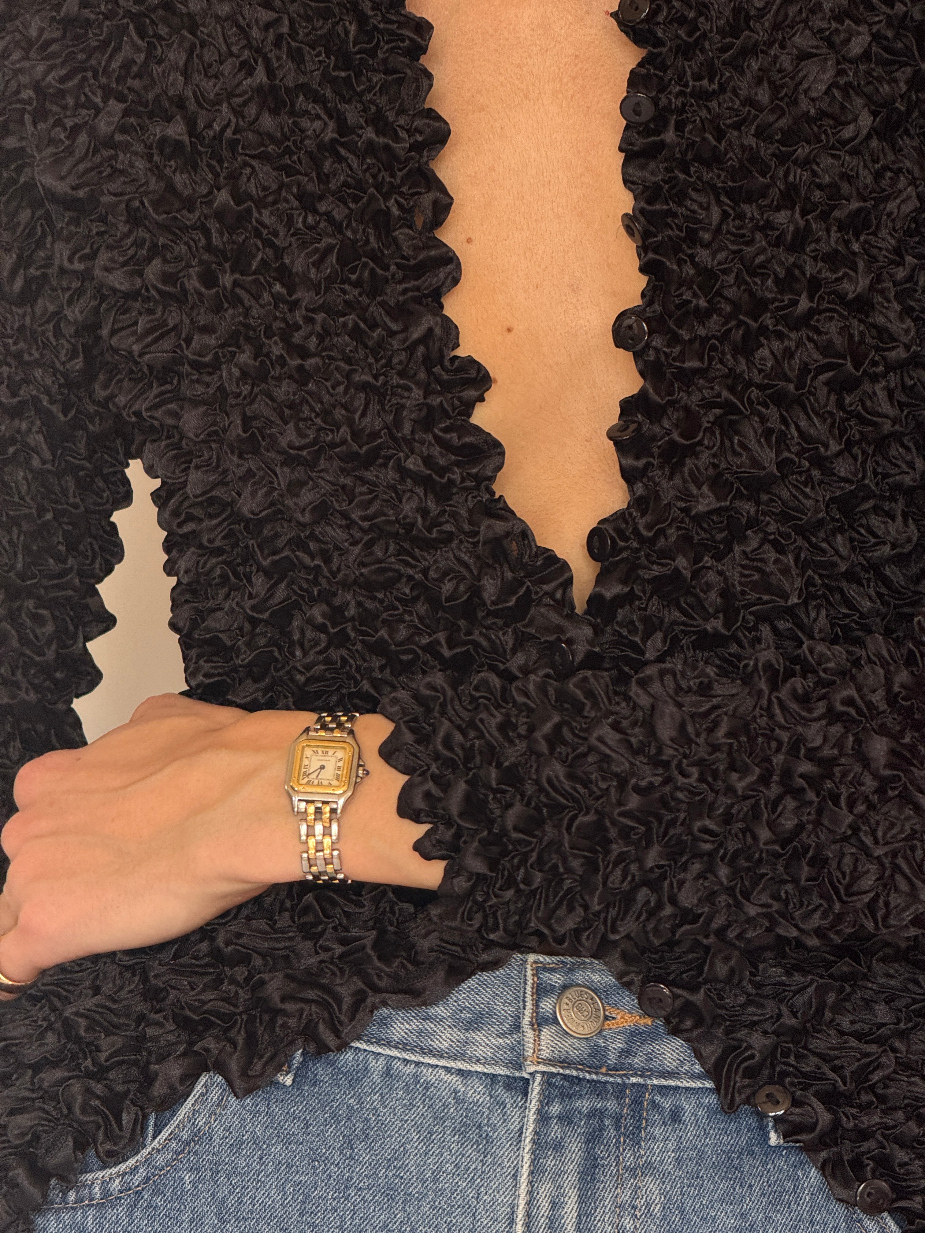 Vintage black popcorn textured fabric close-up