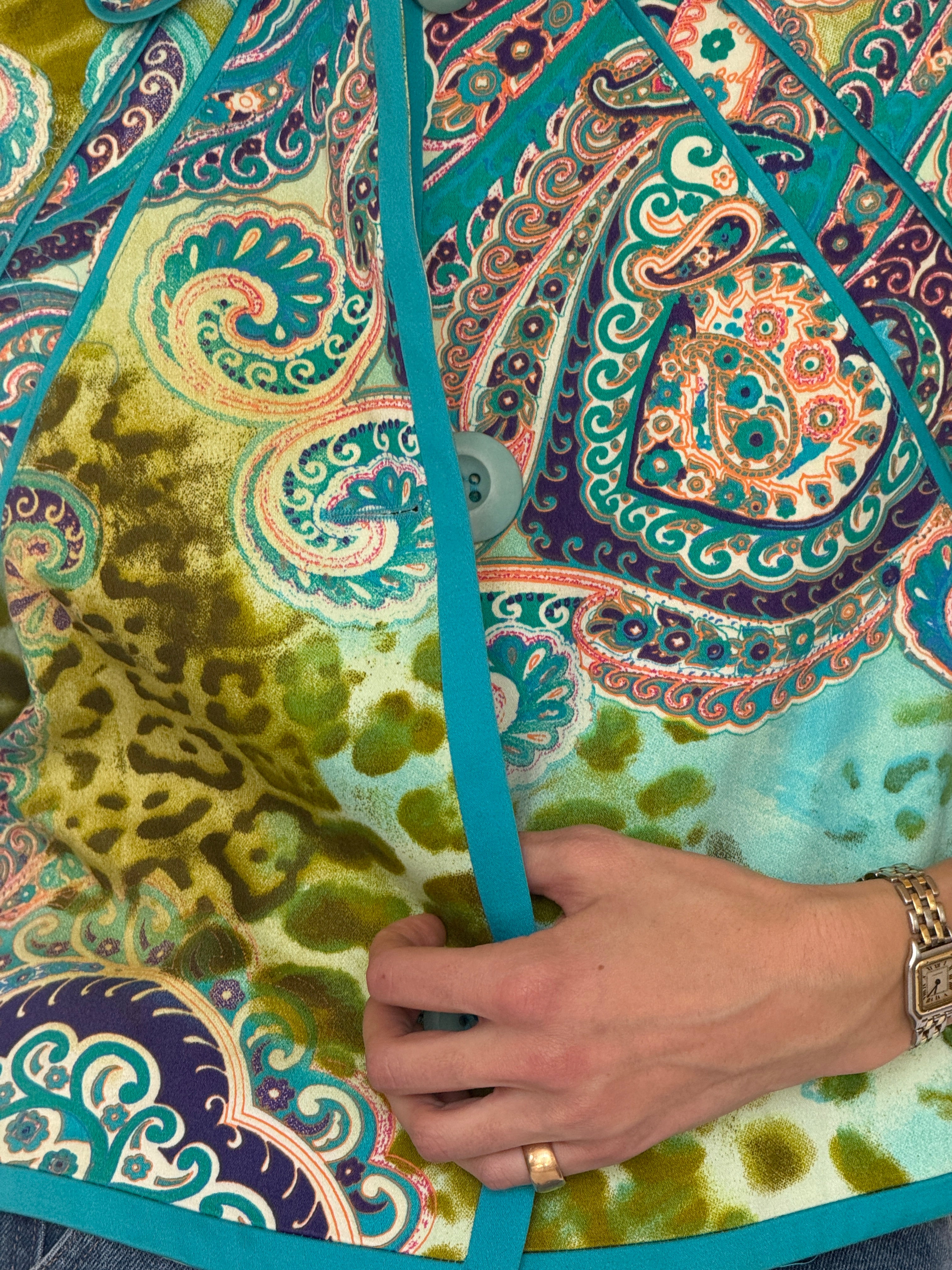 Vintage turquoise paisley jacket button detail close-up