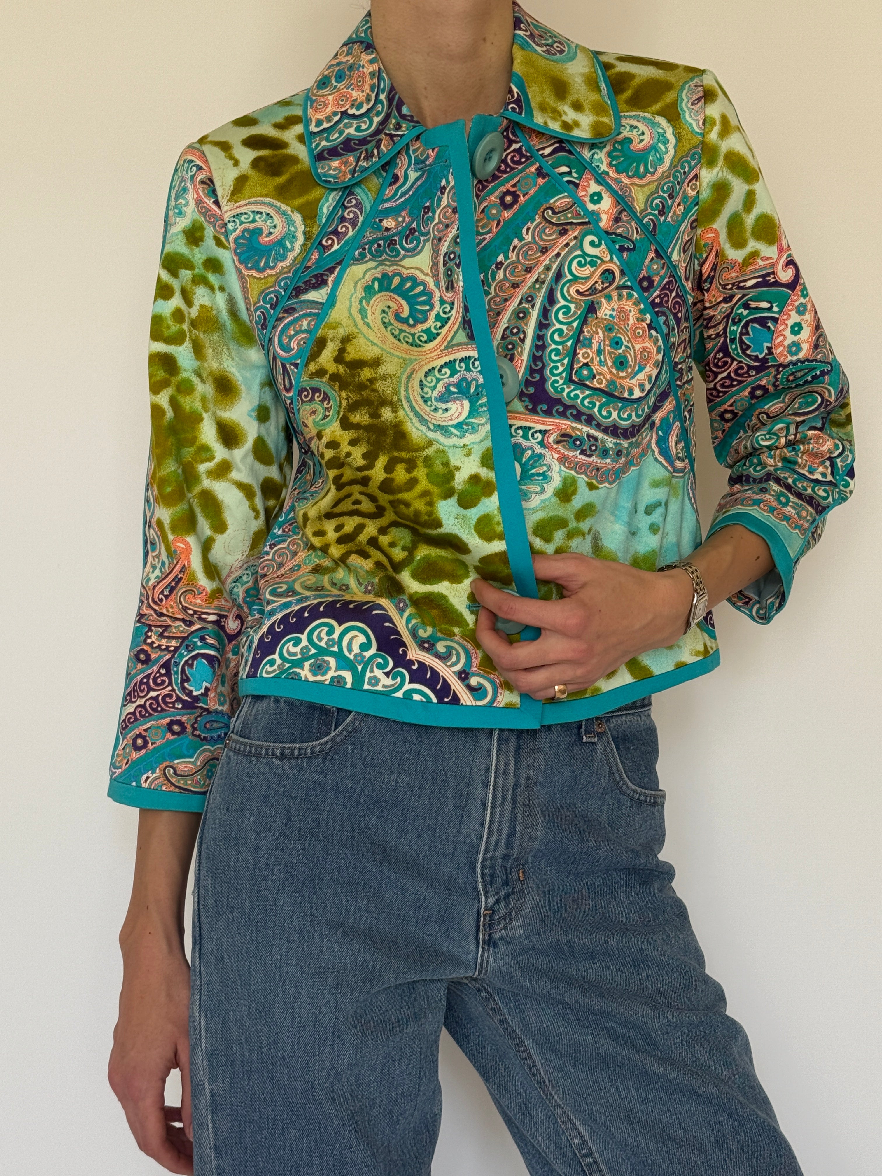Vintage turquoise paisley jacket button detail close-up