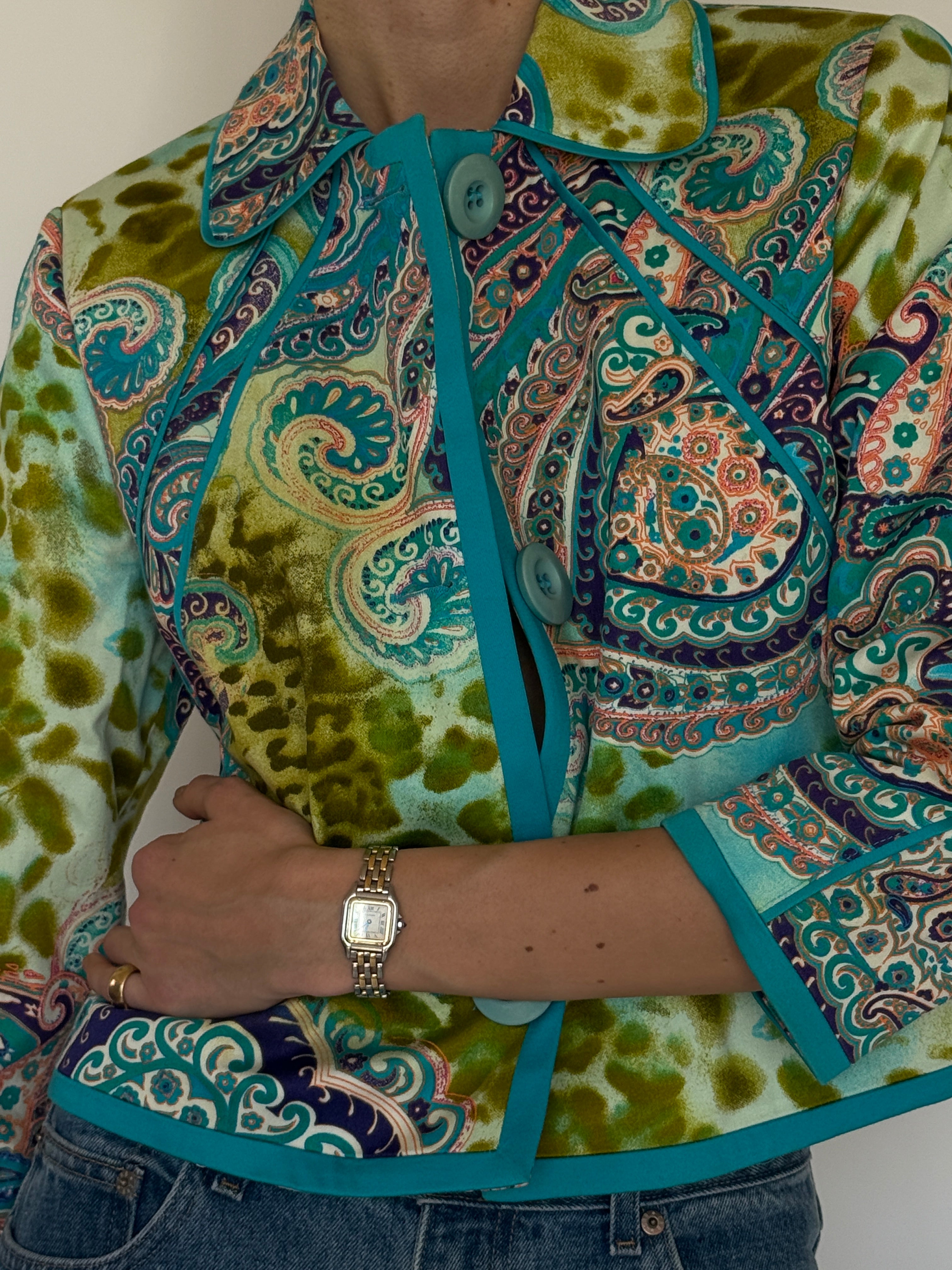 Vintage turquoise paisley print cropped jacket front view with contrast piping