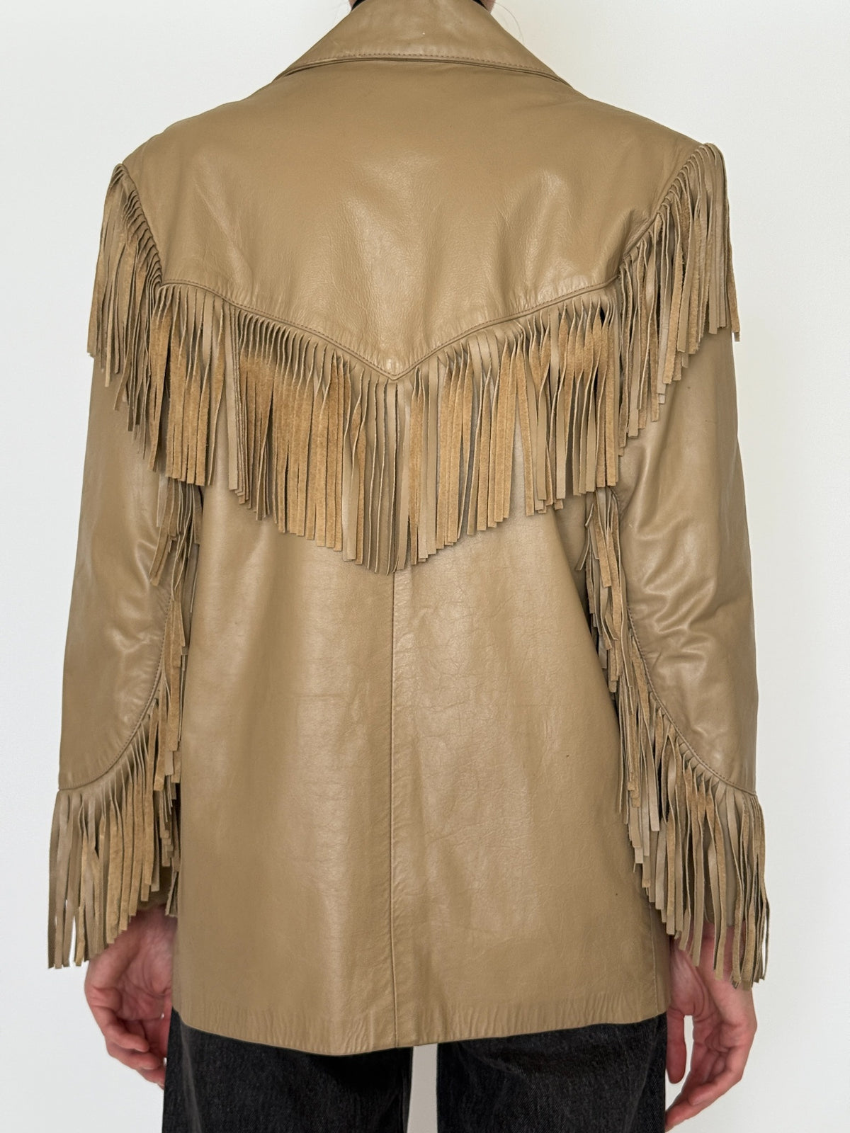 Side angle of tan Western jacket