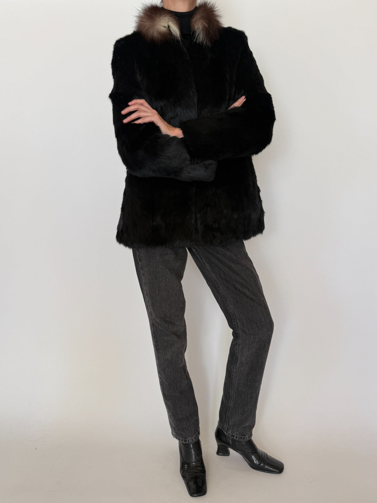 Black fur jacket sleeve and texture detail