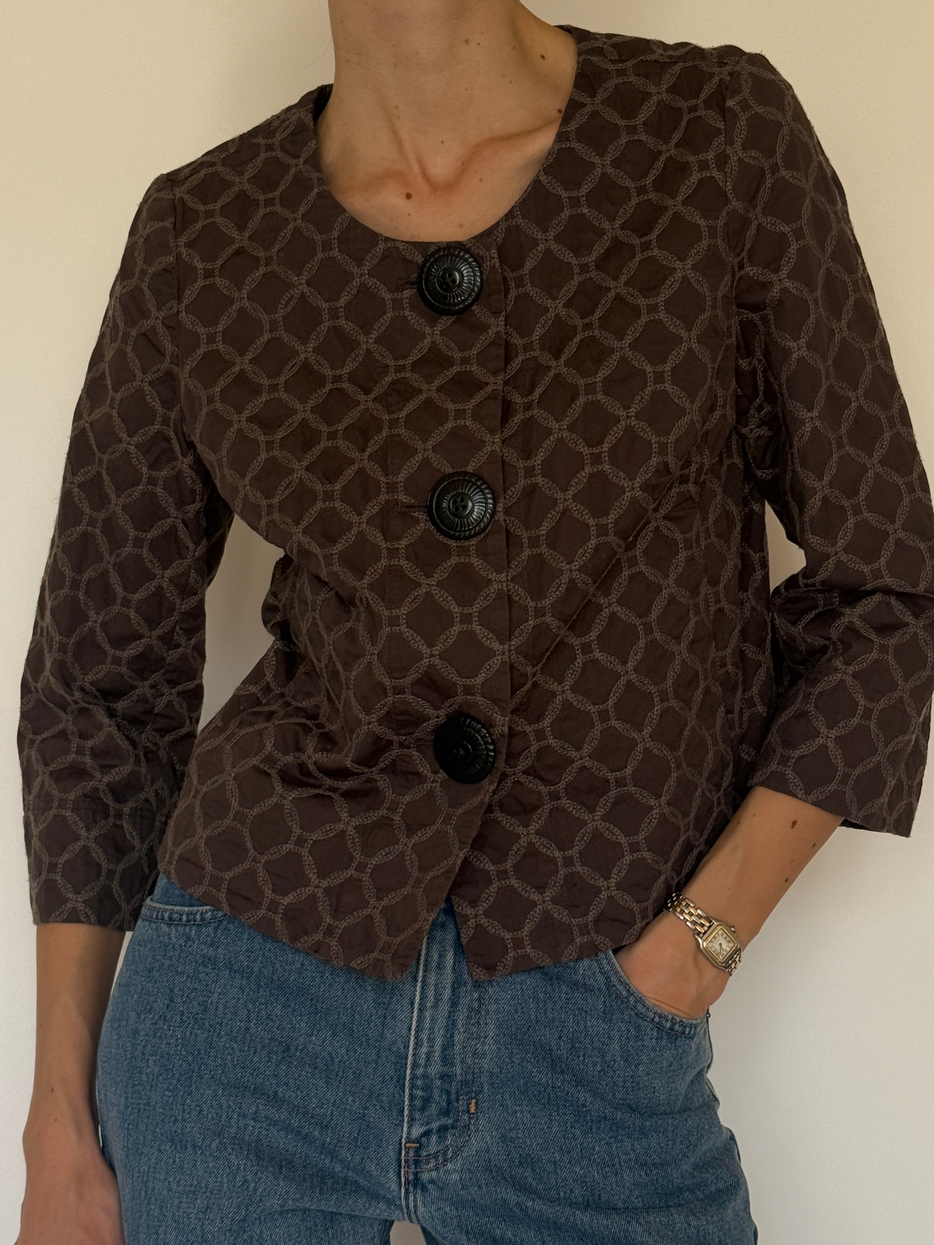 Vintage brown geometric embroidered jacket sleeve detail