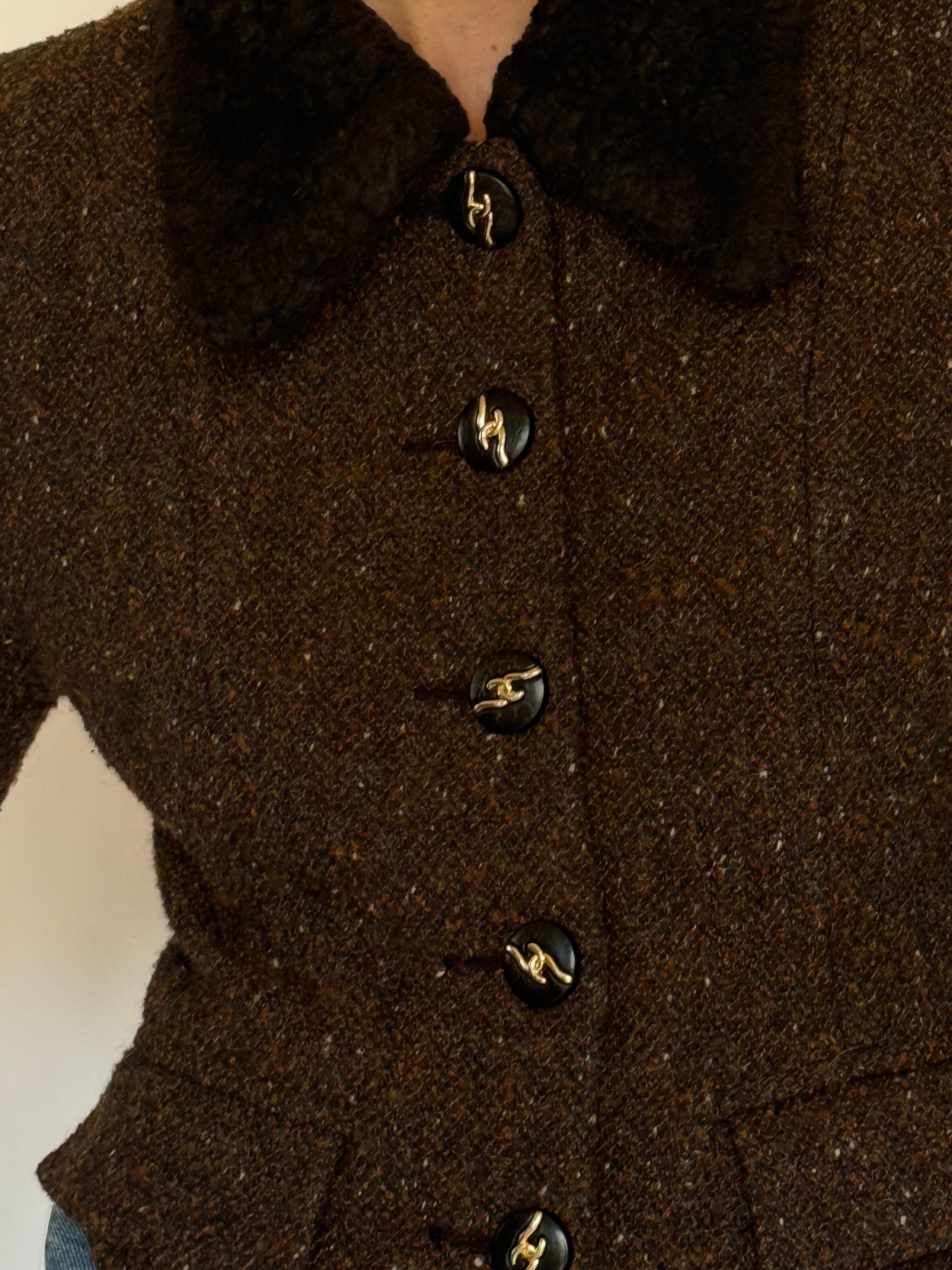 Vintage brown tweed jacket button detail close-up