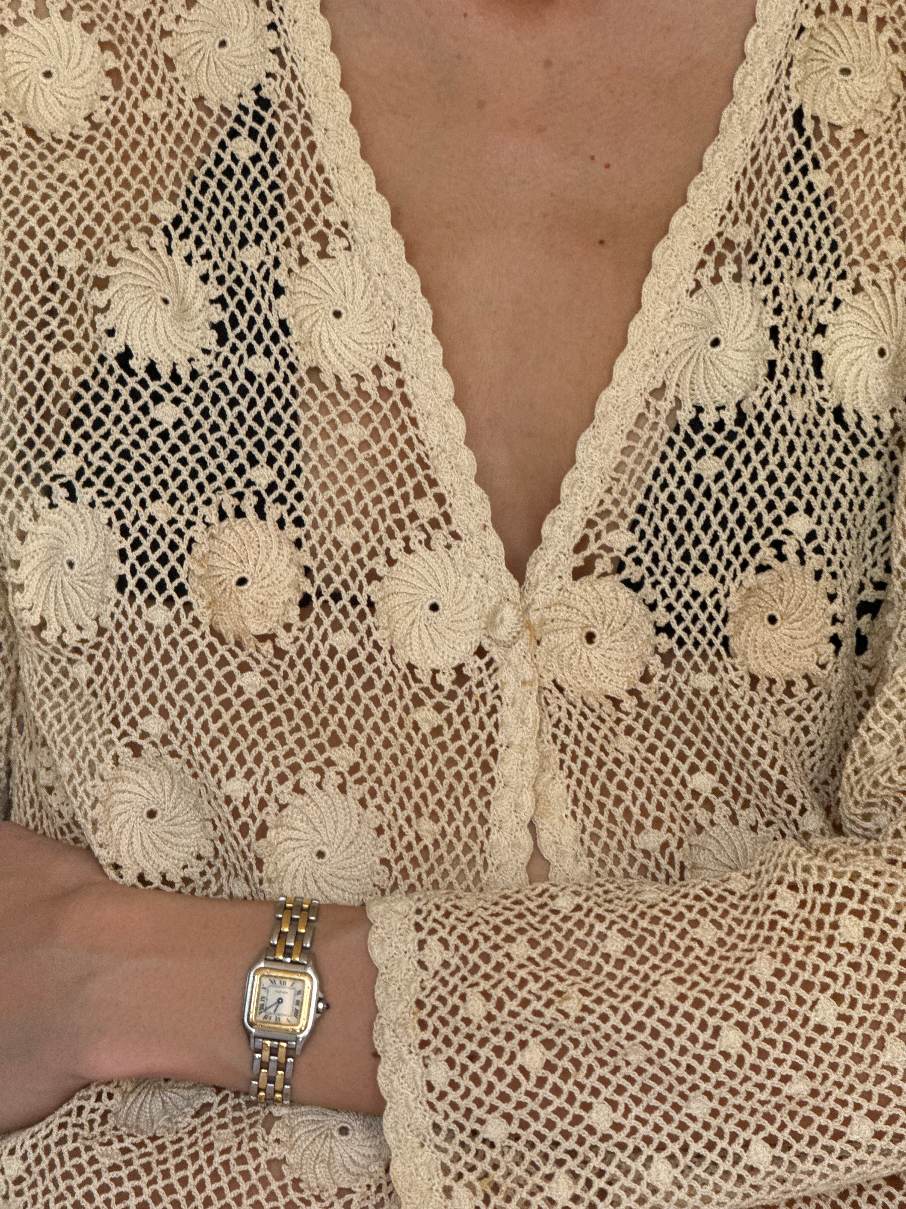 Vintage cream crochet jacket fabric close-up