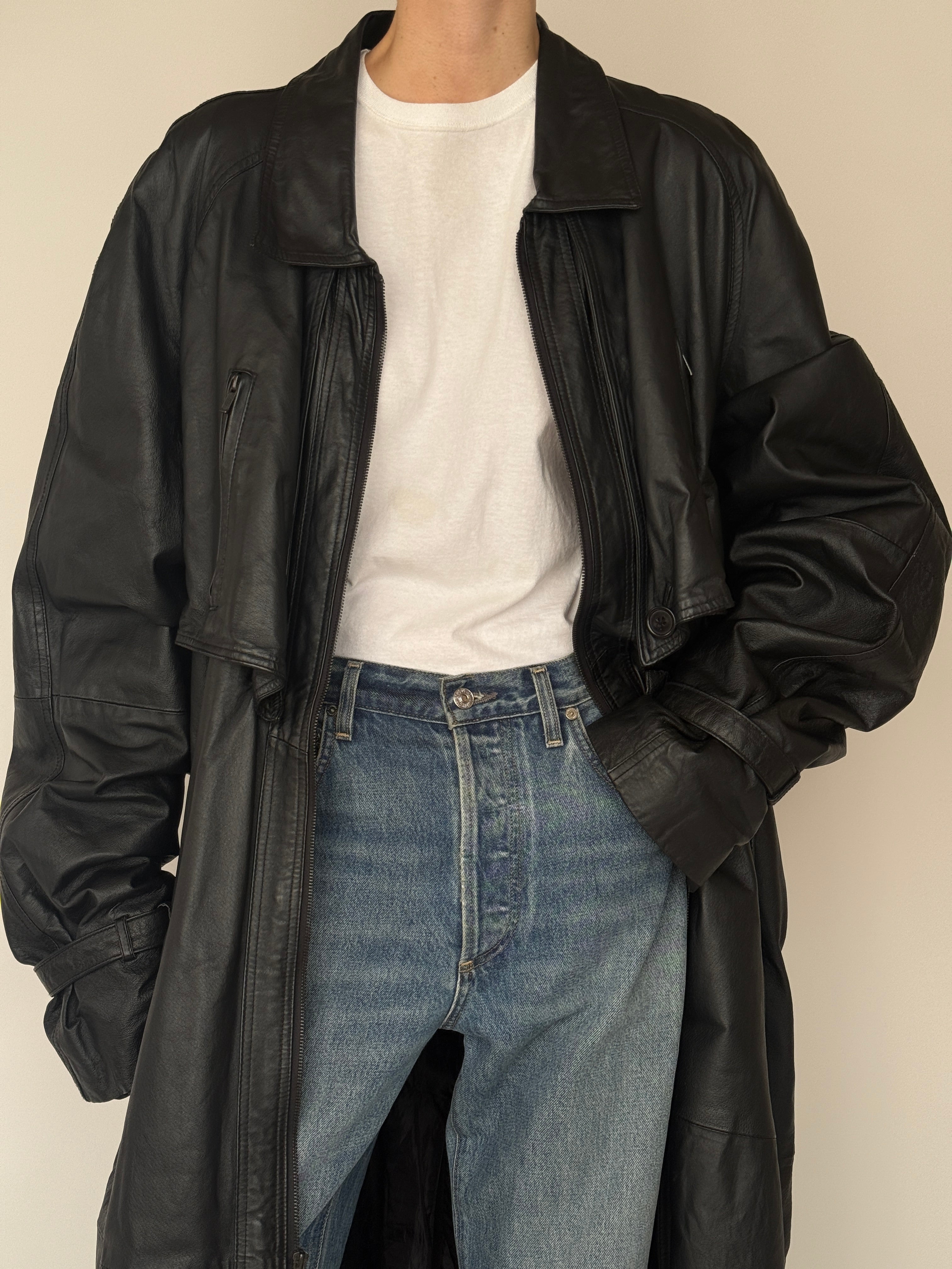 Vintage black leather coat leather texture detail