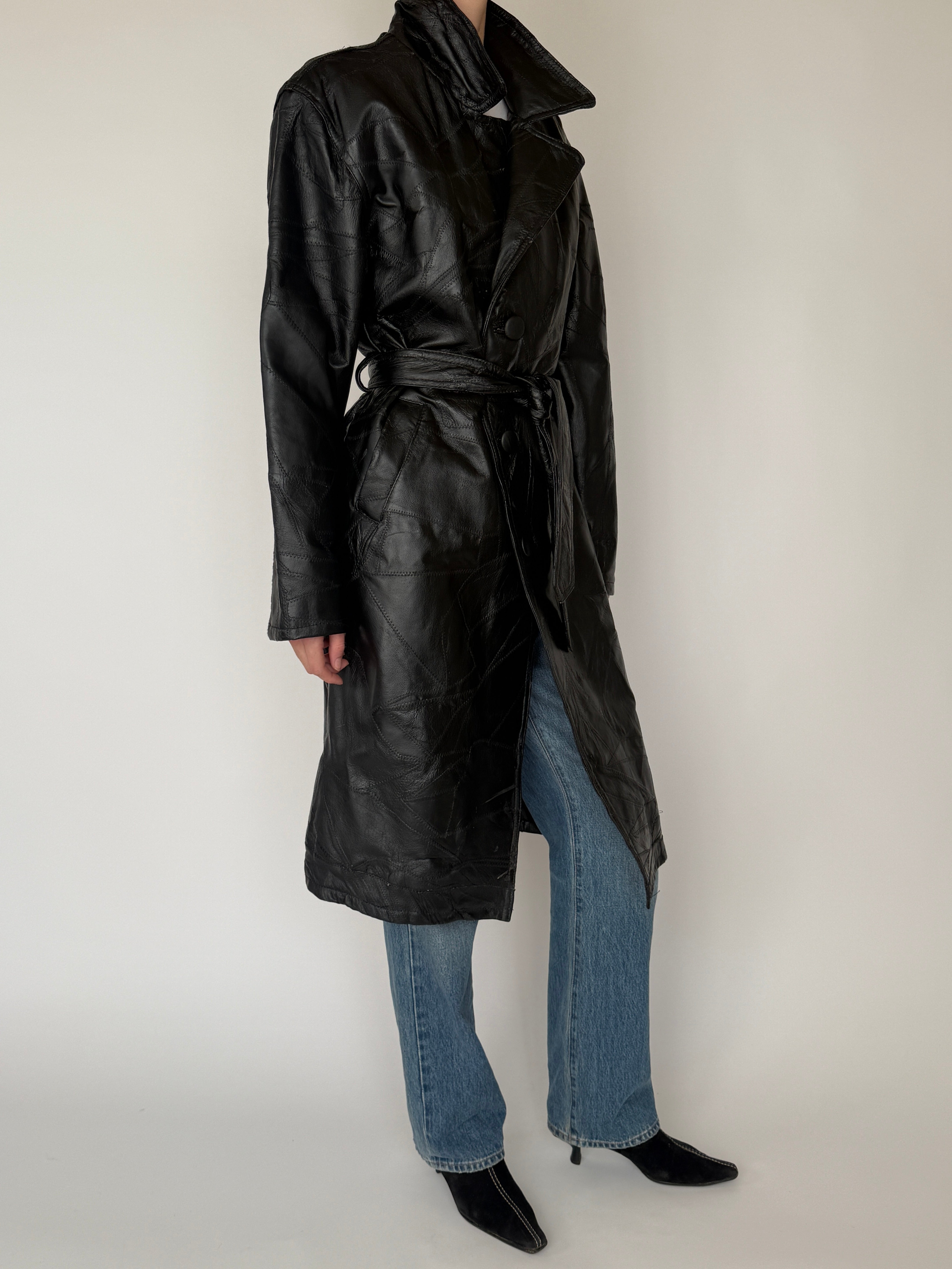 Vintage black leather trench coat button detail