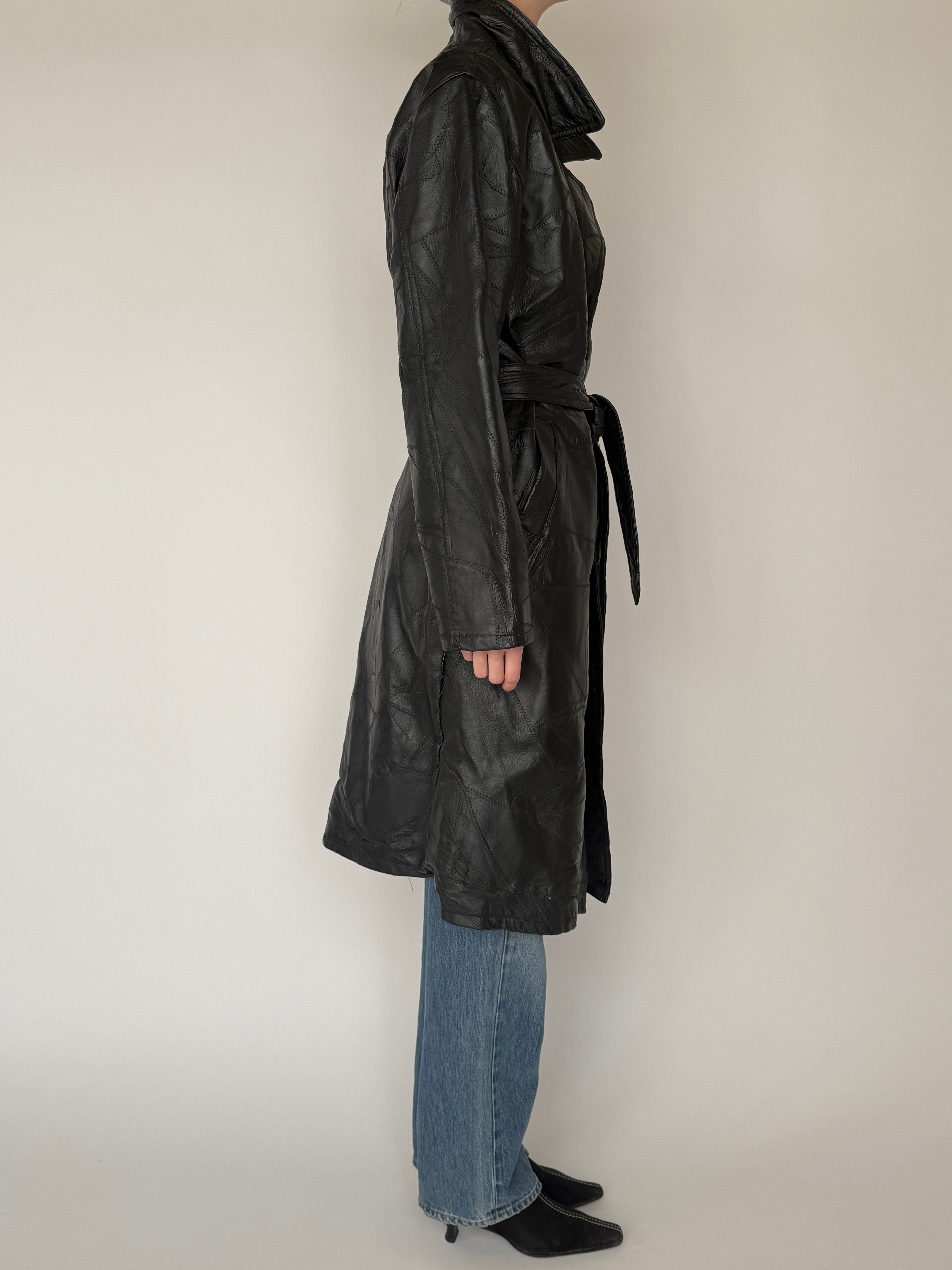 Vintage black leather trench coat side view