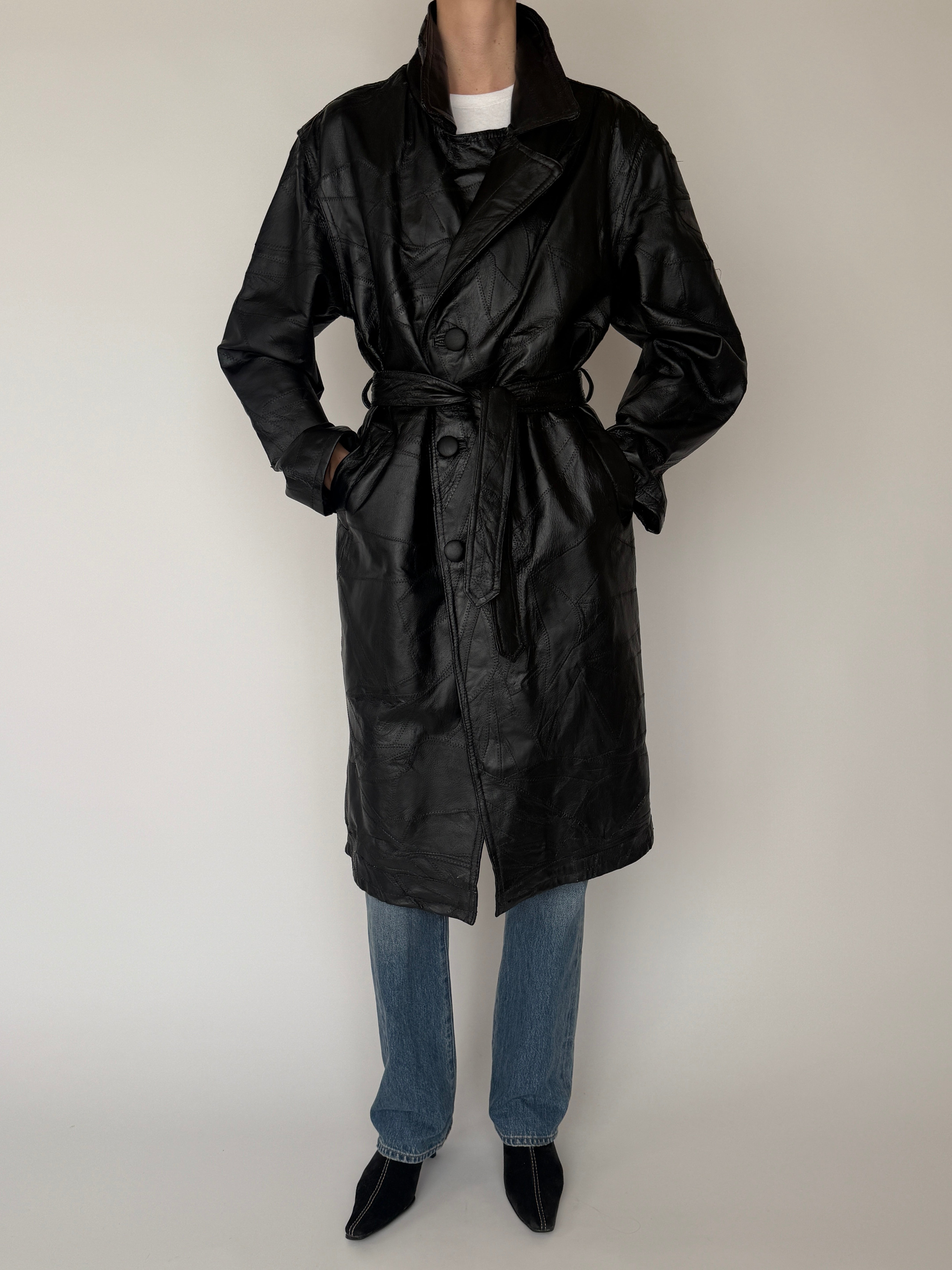 Vintage black leather trench coat front view full body