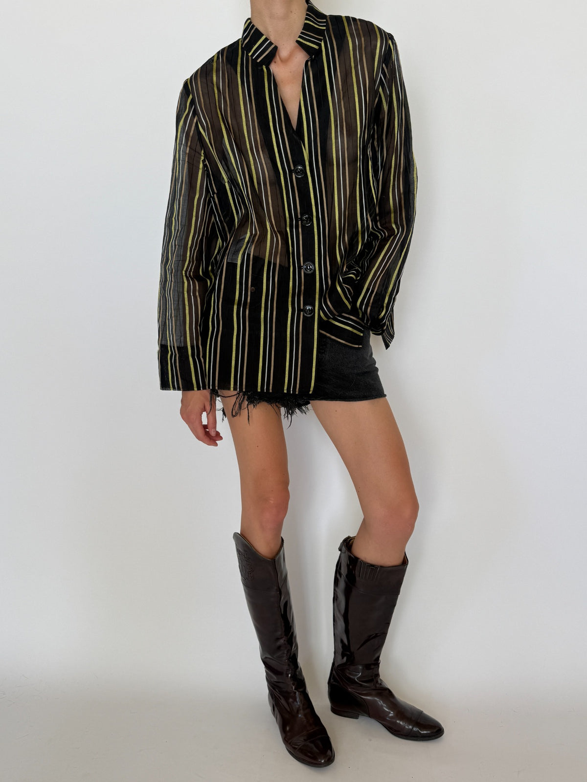 Three-quarter styled view of vintage black brown green striped cotton silk shirt