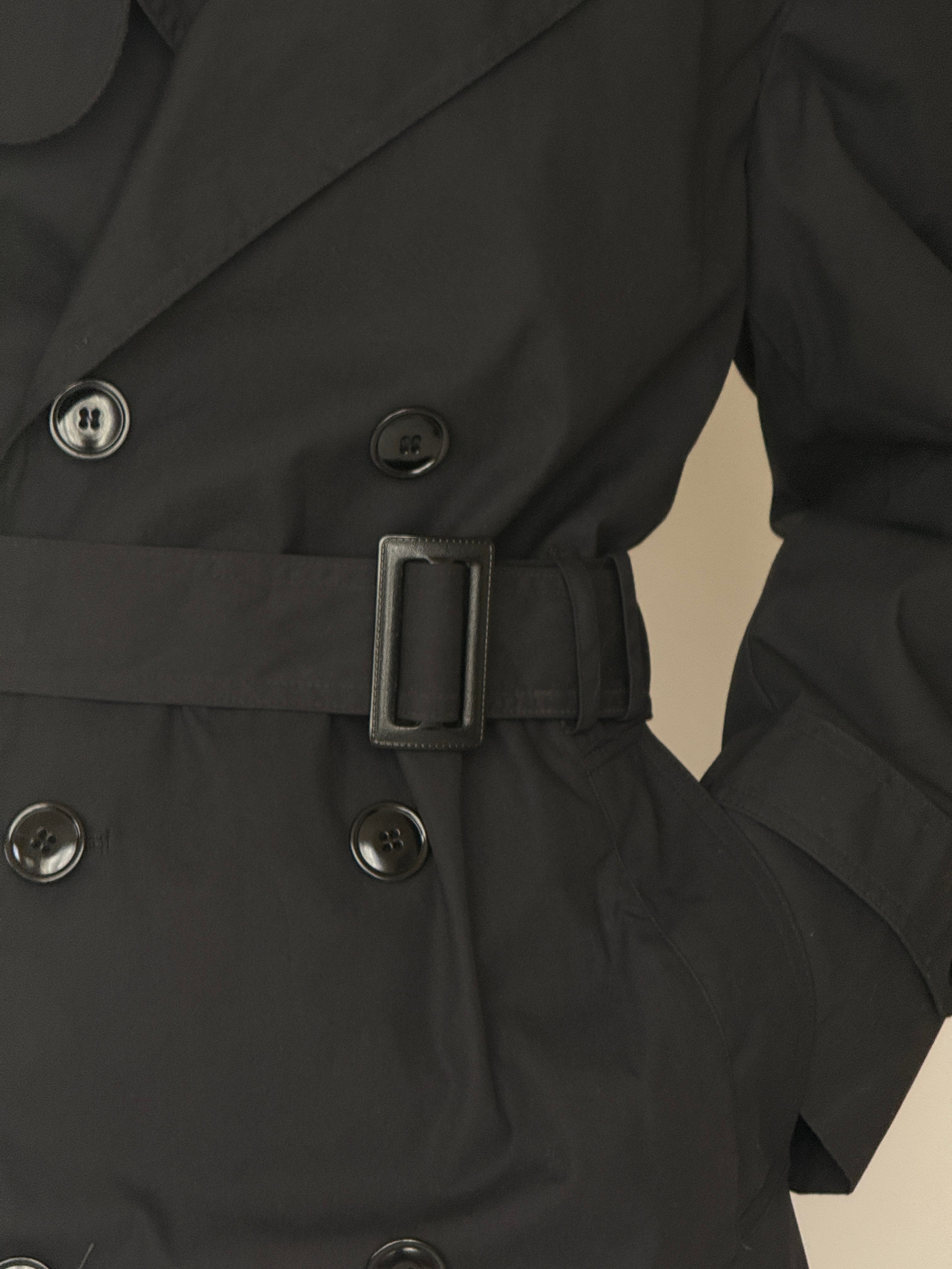Vintage black trench coat waist belt detail