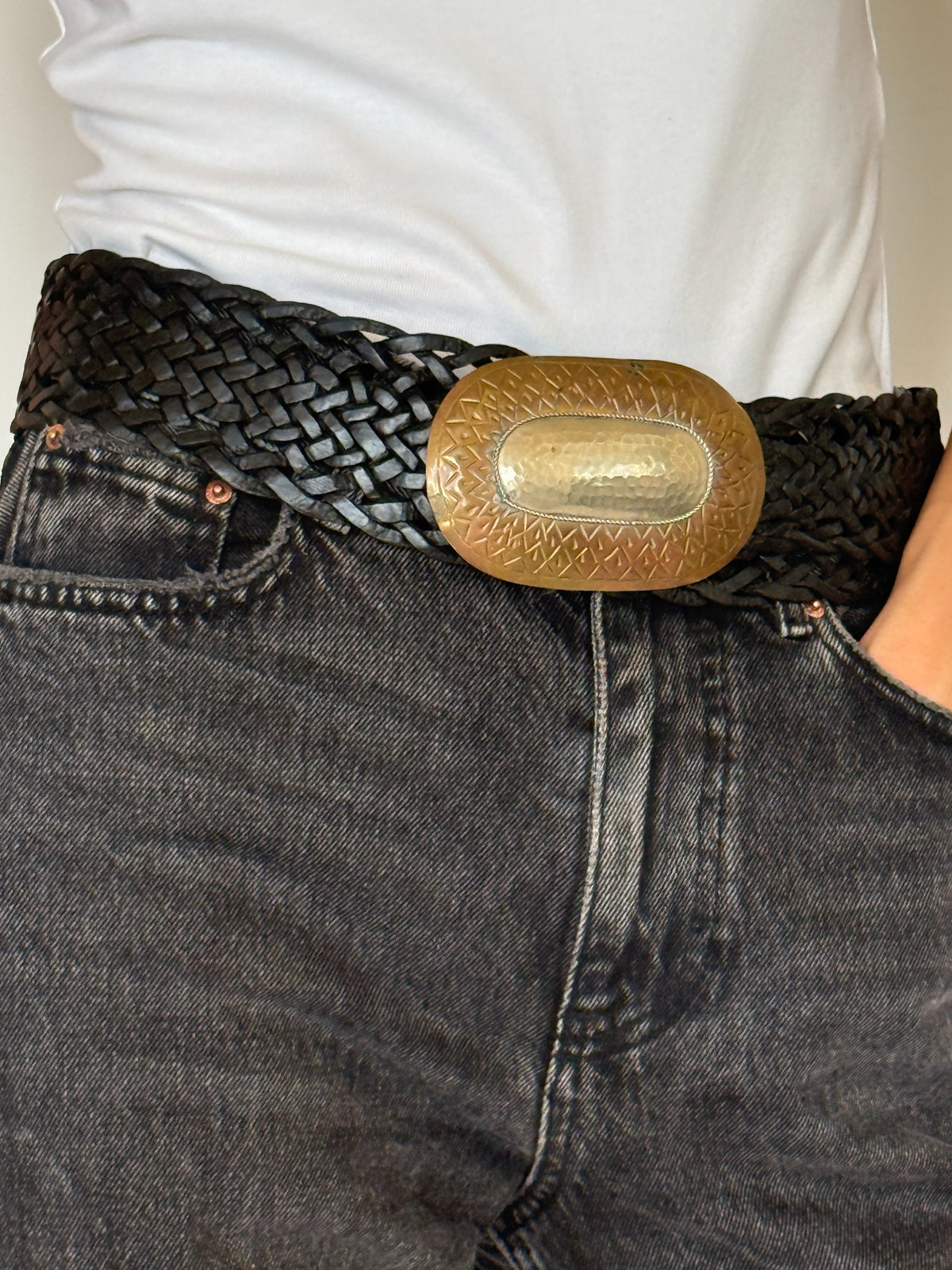 Vintage black braided belt buckle detail