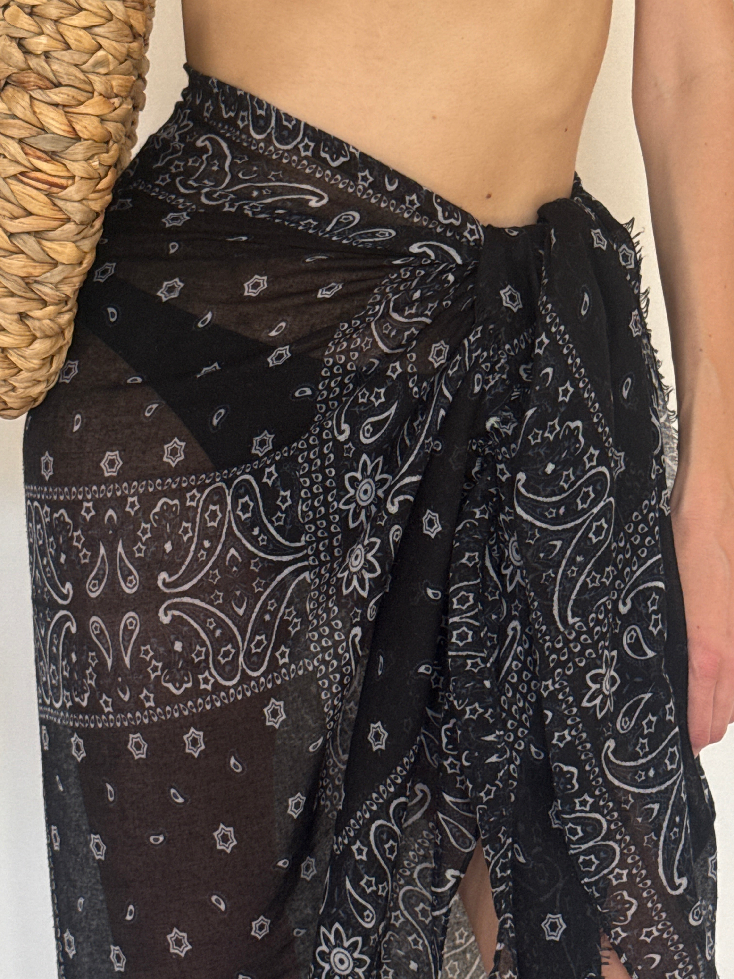 Vintage black sheer paisley sarong fabric close-up