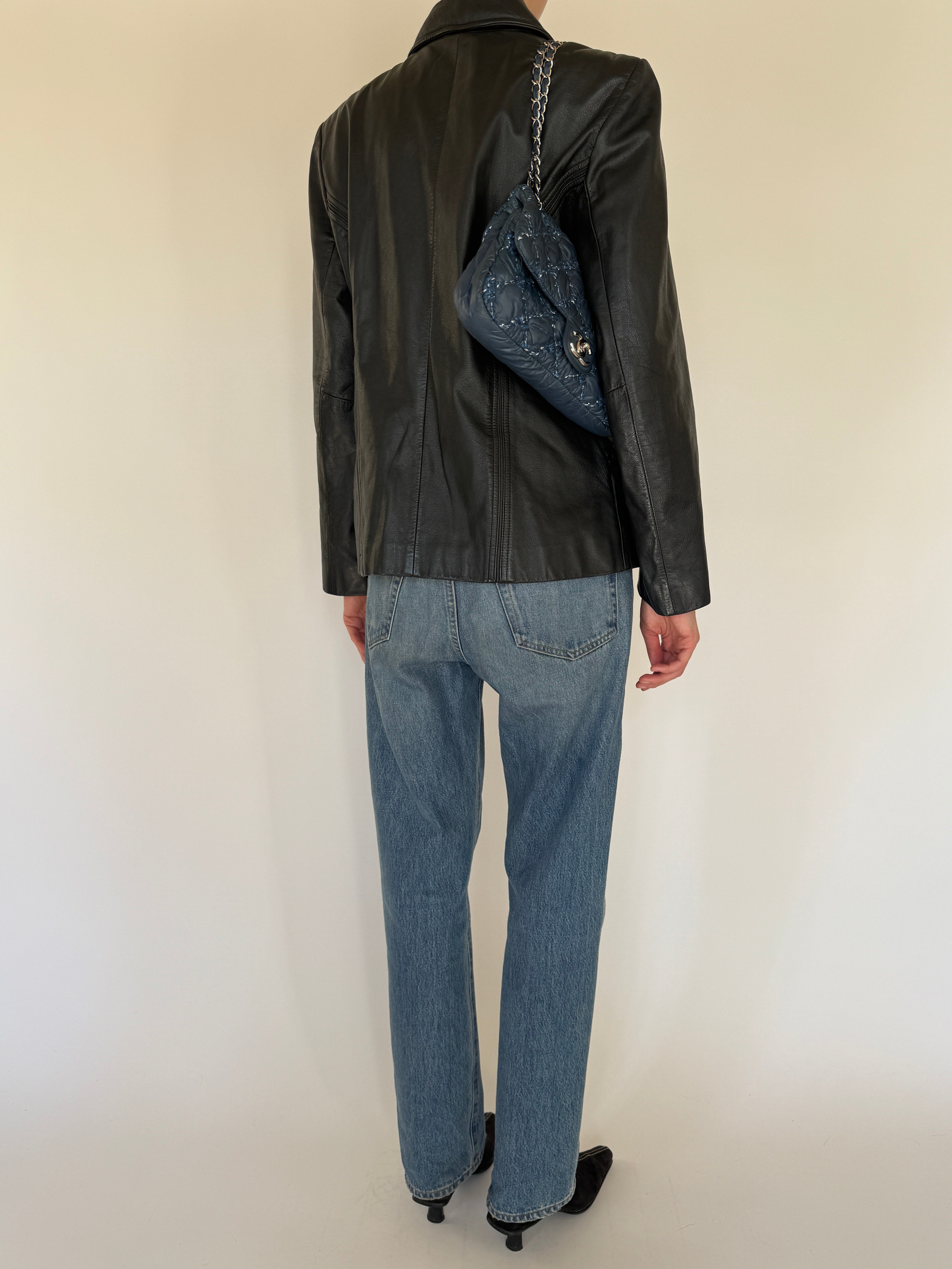 Vintage black leather jacket back view