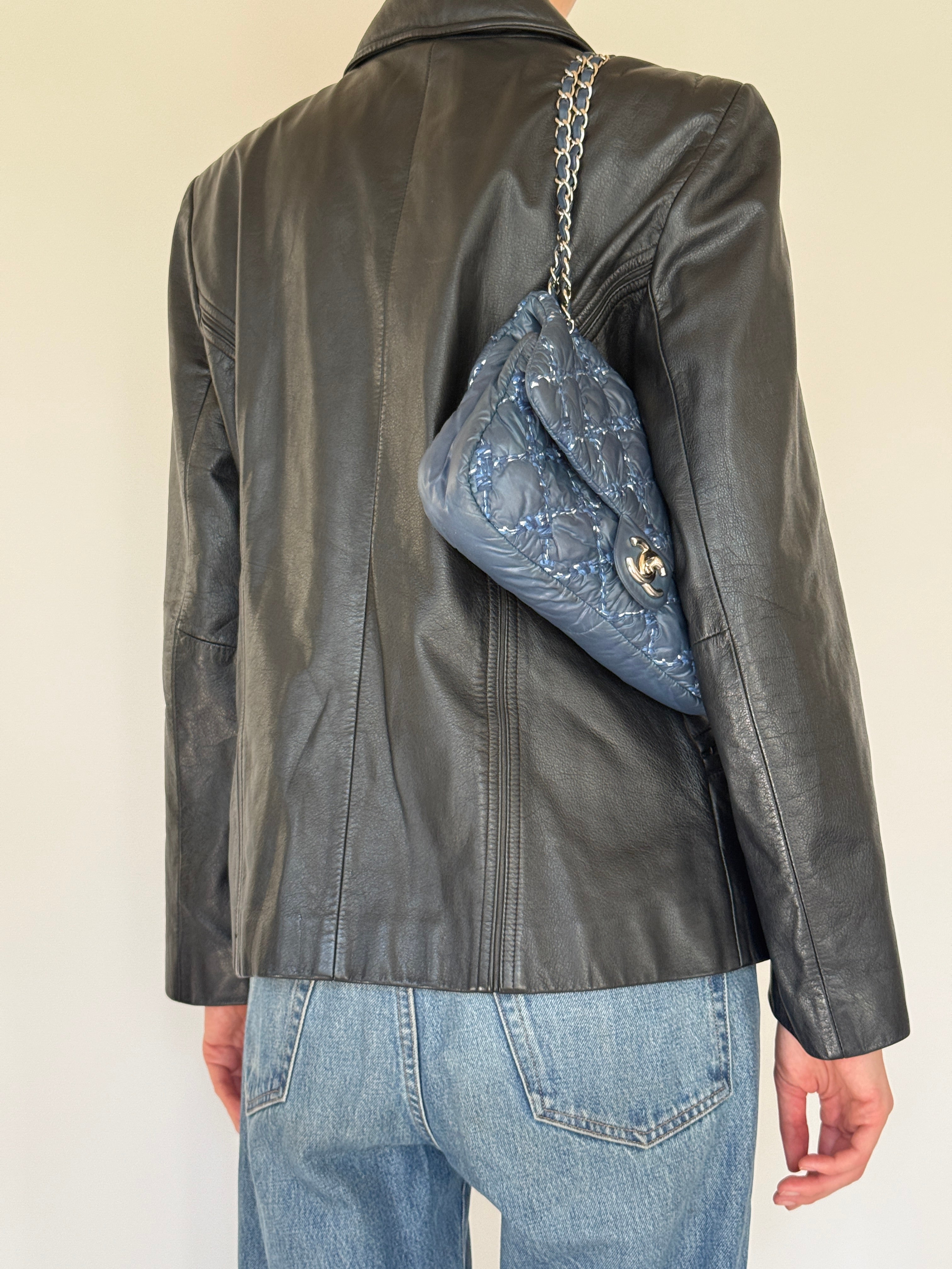 Vintage black leather jacket back view
