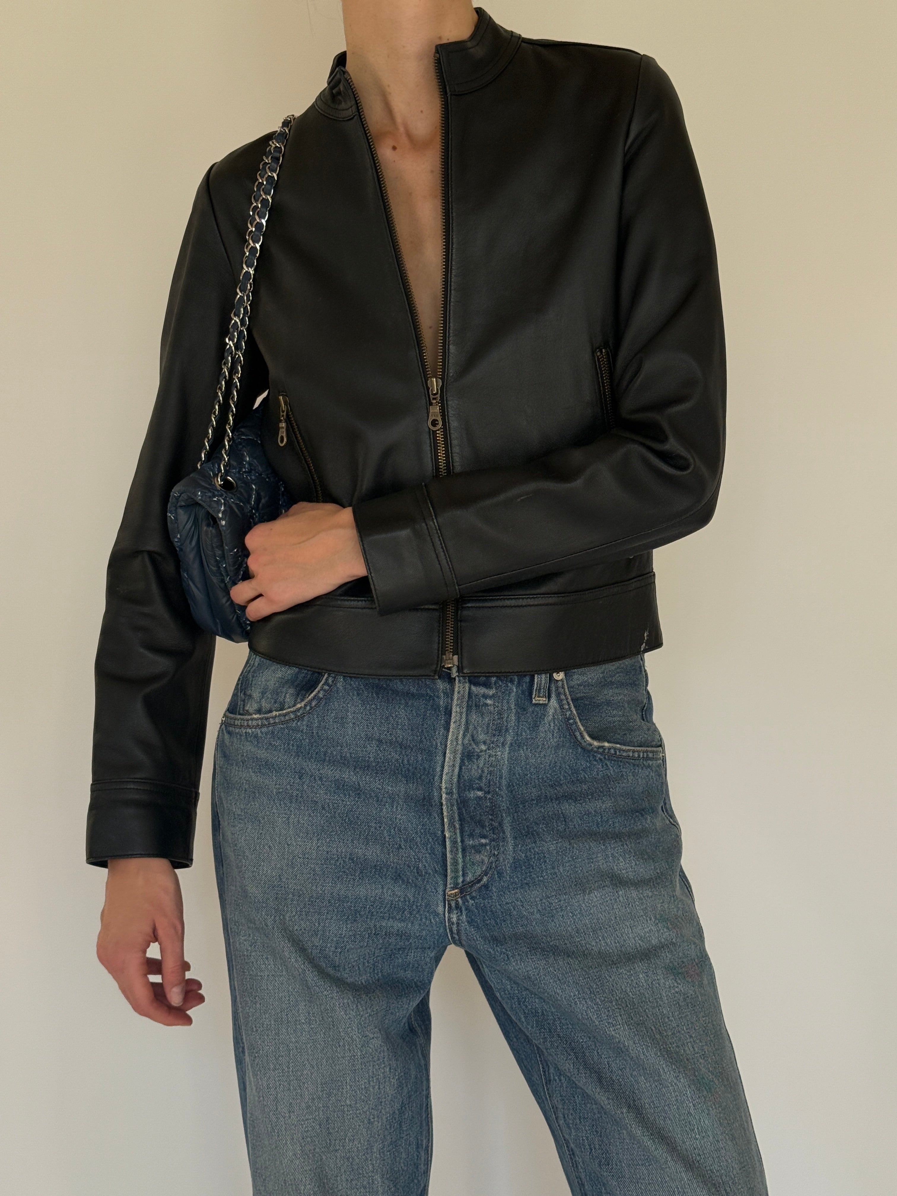 Vintage black leather jacket leather texture close-up