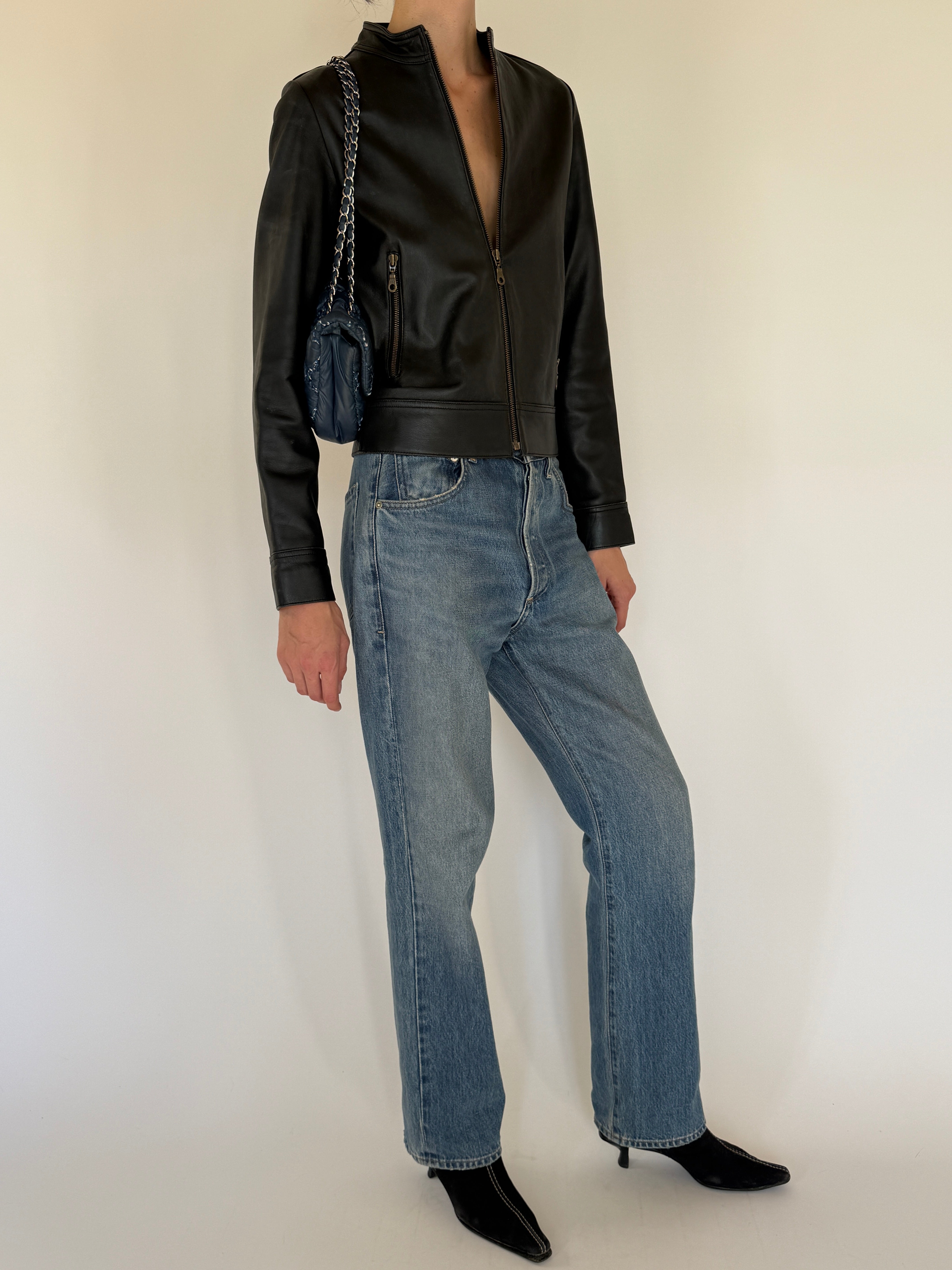 Vintage black leather jacket side view