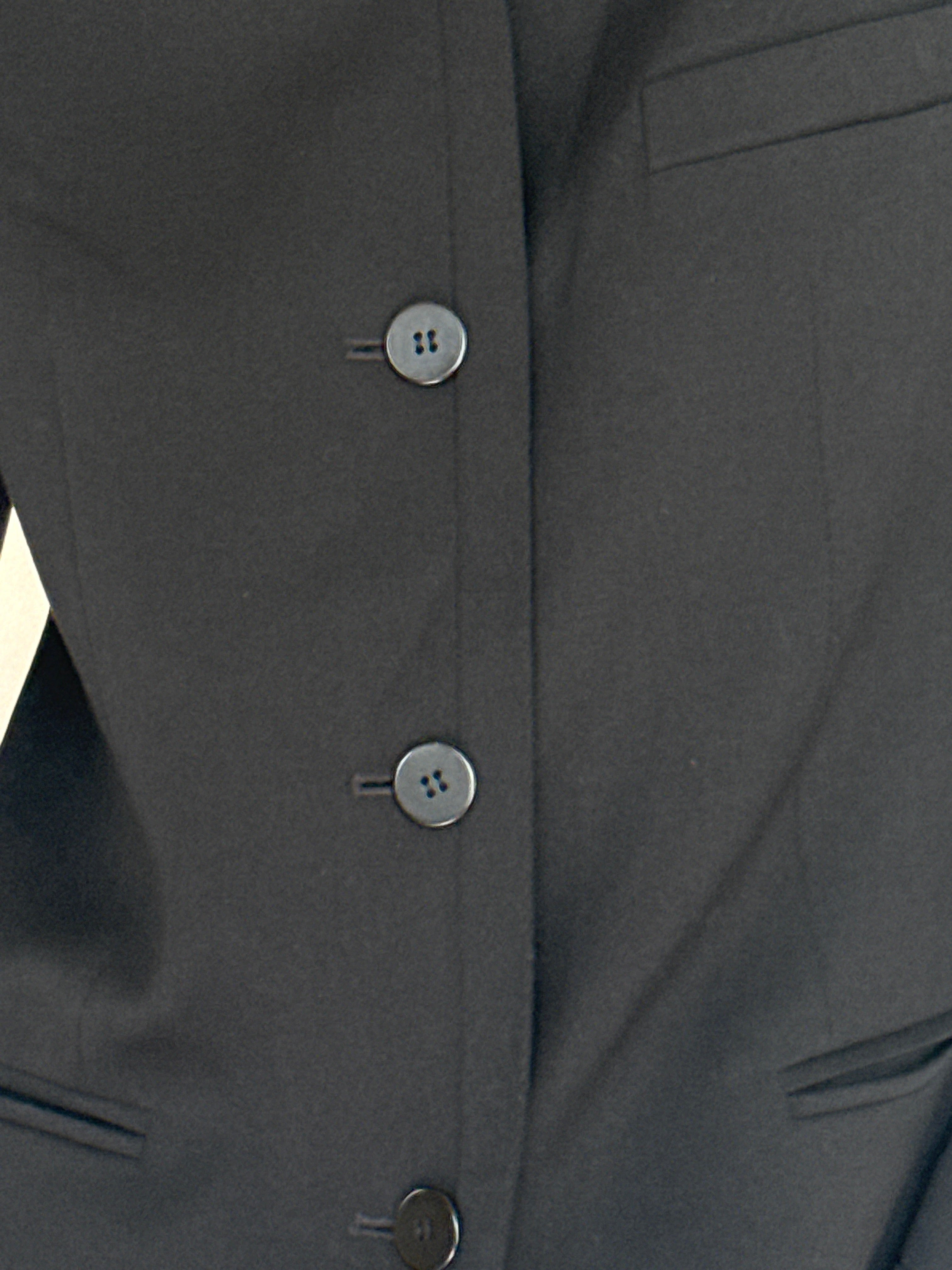 Vintage black structured button-front blazer front pocket detail
