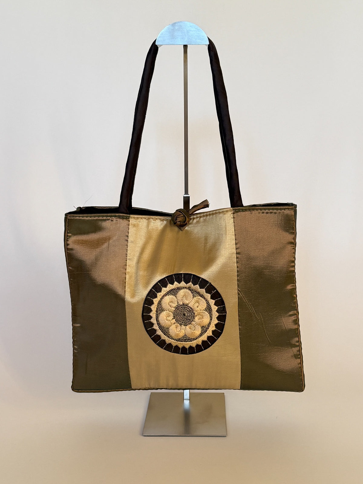 Front view of vintage gold and bronze embroidered satin tote bag
