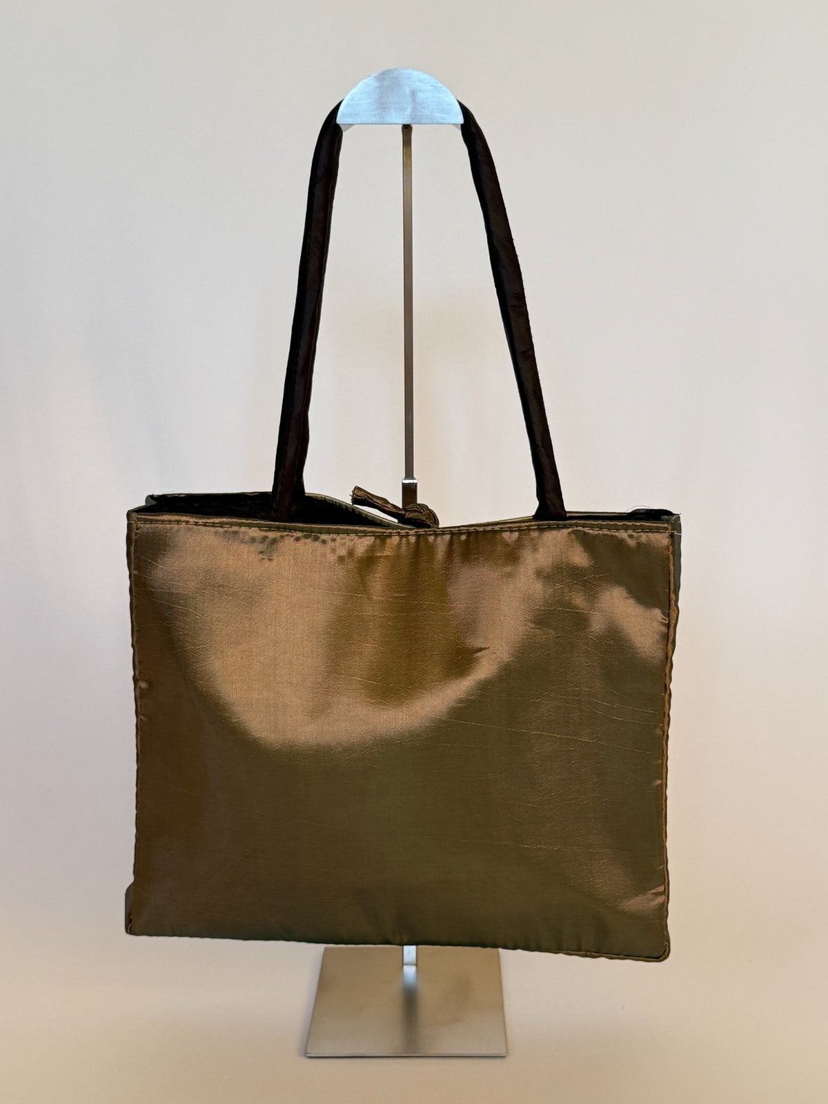 Back view of bronze satin tote bag