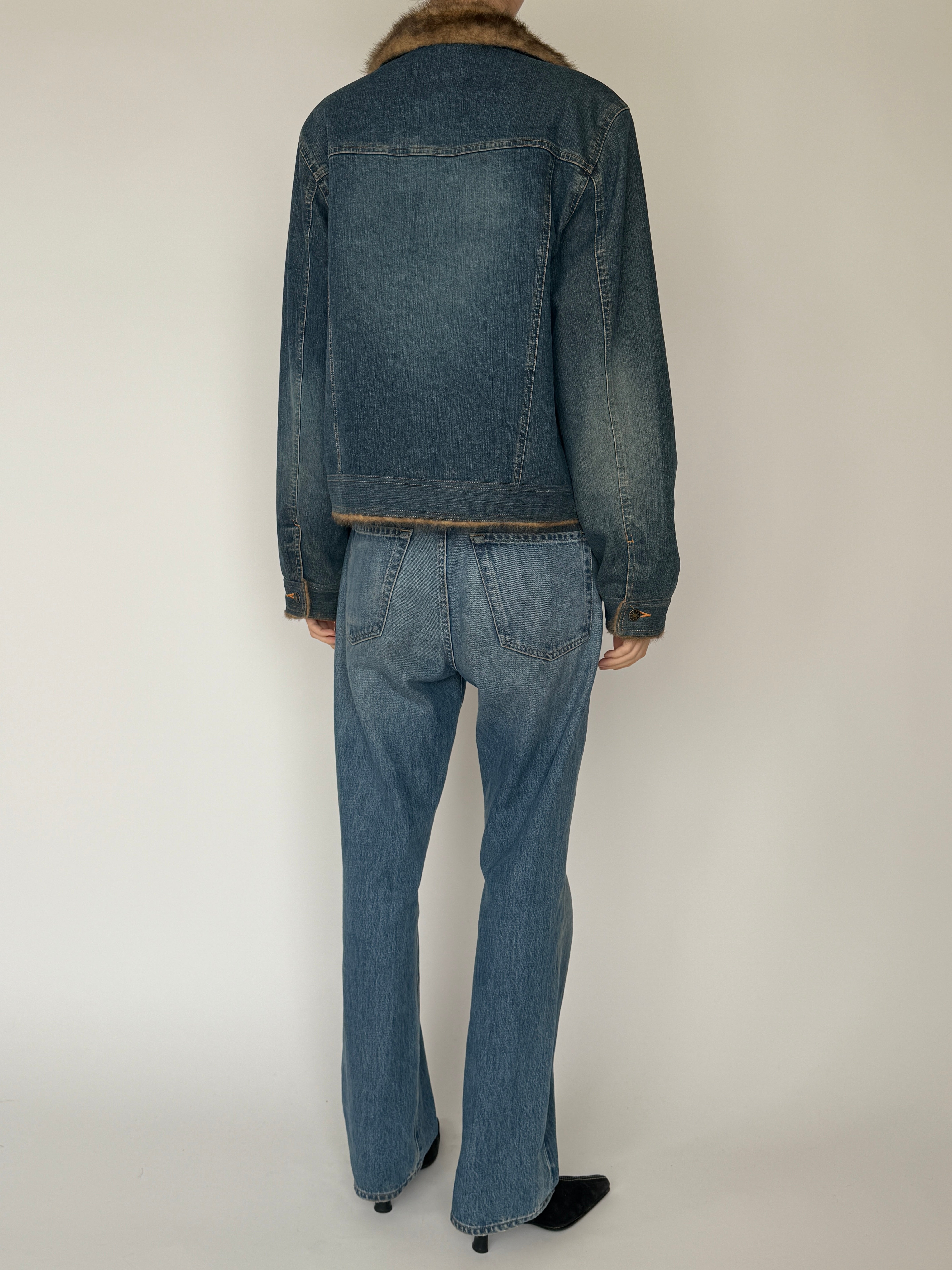 Vintage faux fur lined denim jacket with chest flap pockets in blue back view