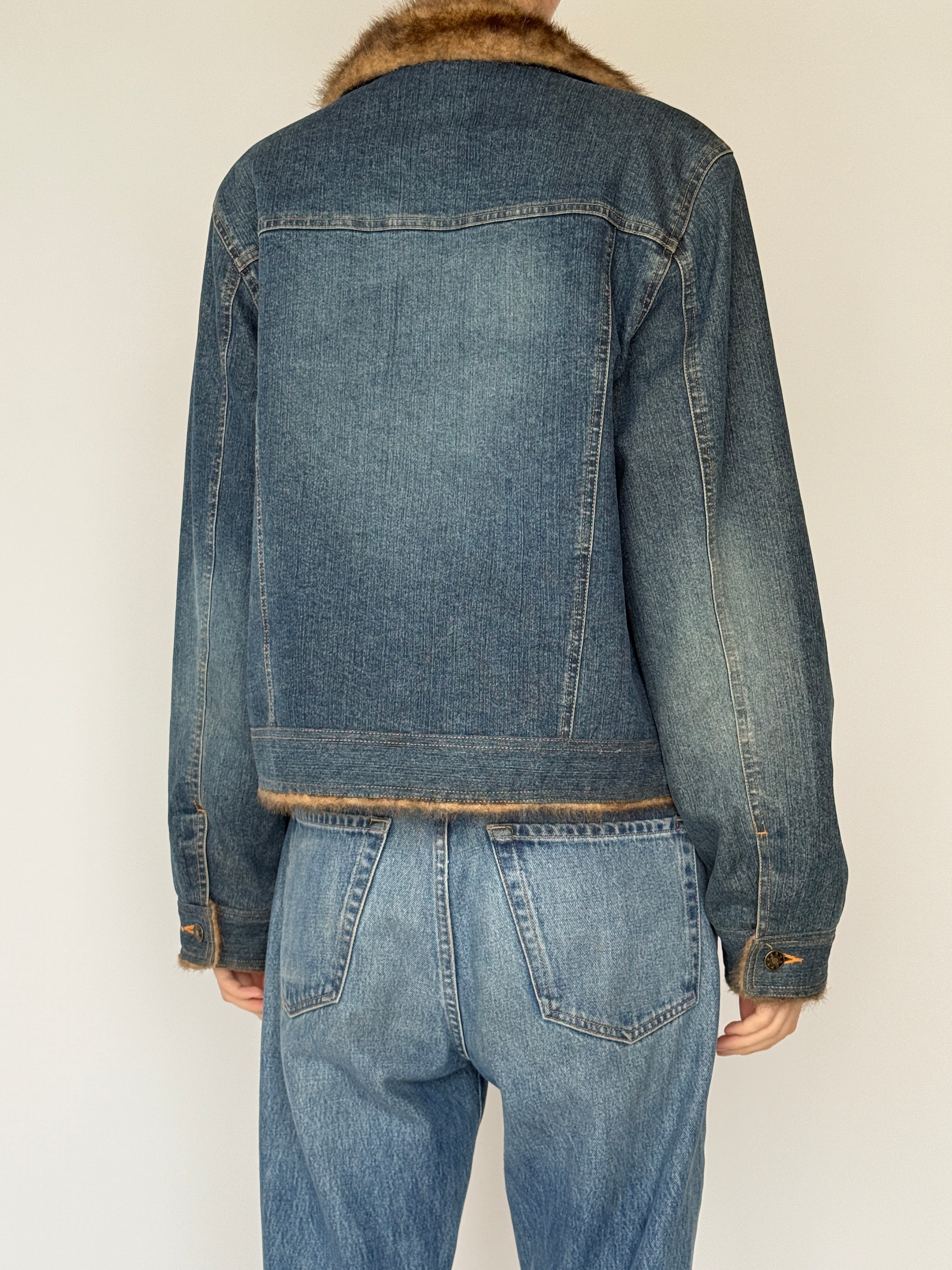 Vintage denim jacket with faux fur lining and button-front closure in blue back details