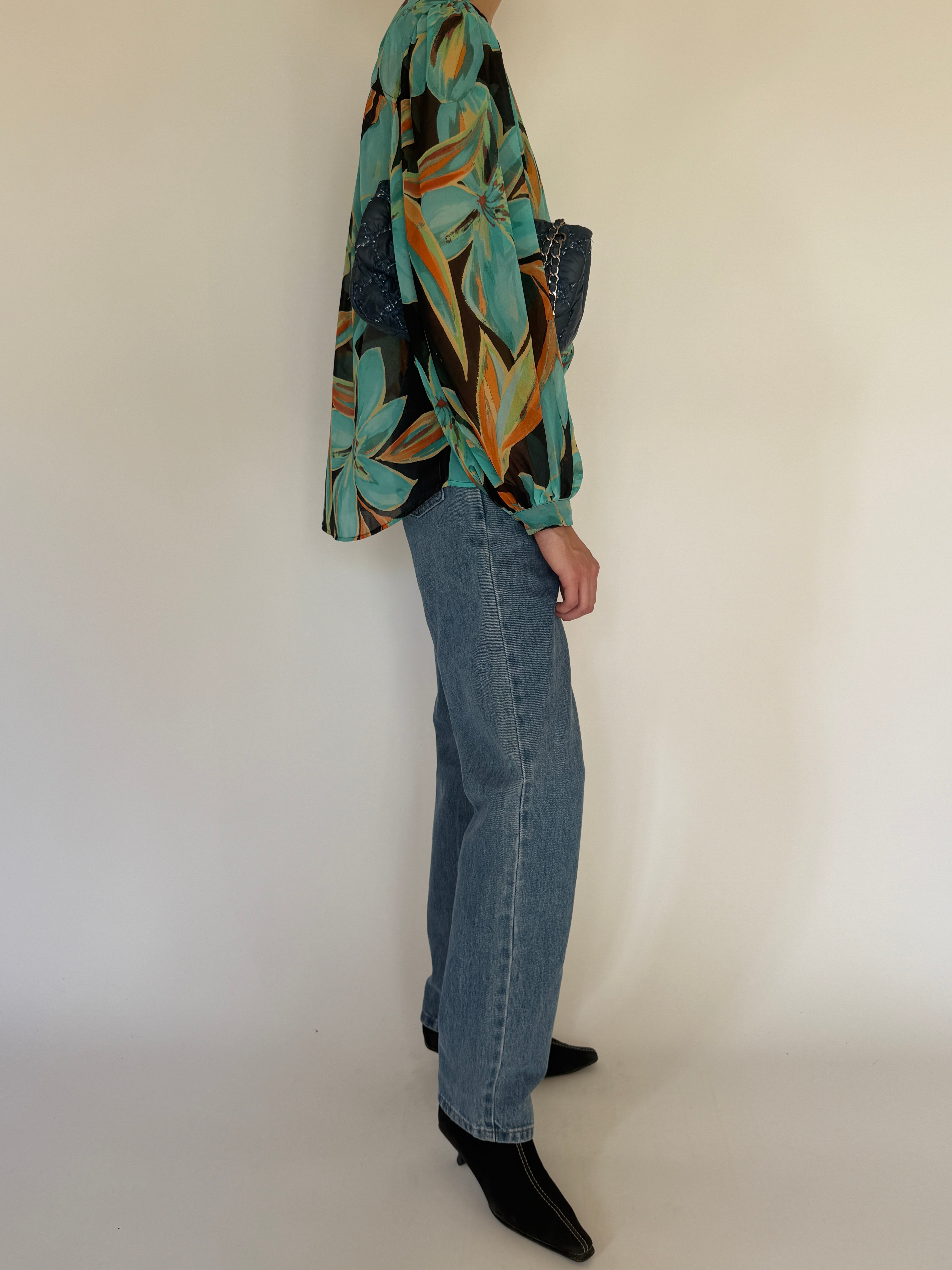 Vintage floral blouse turquoise black side view