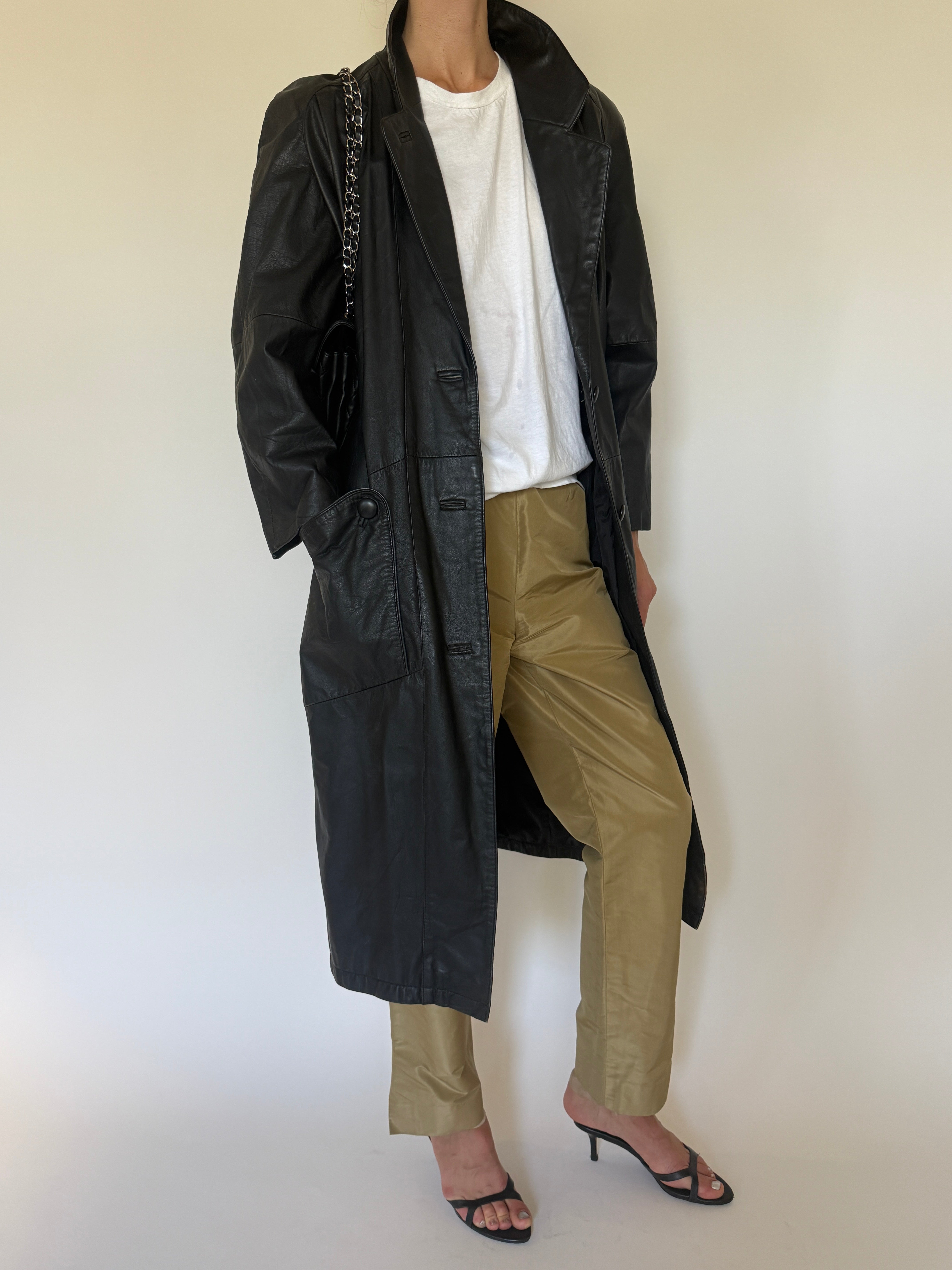 Vintage black leather trench coat front view