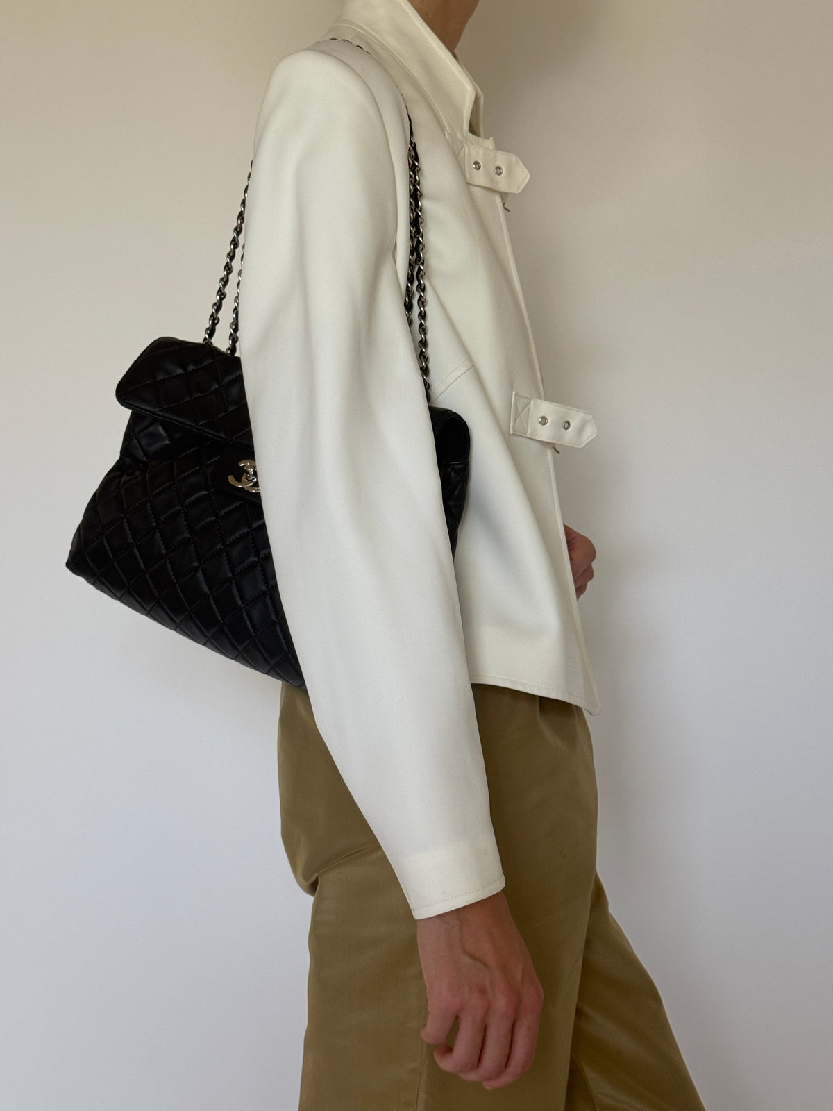Vintage ivory buckle jacket side view