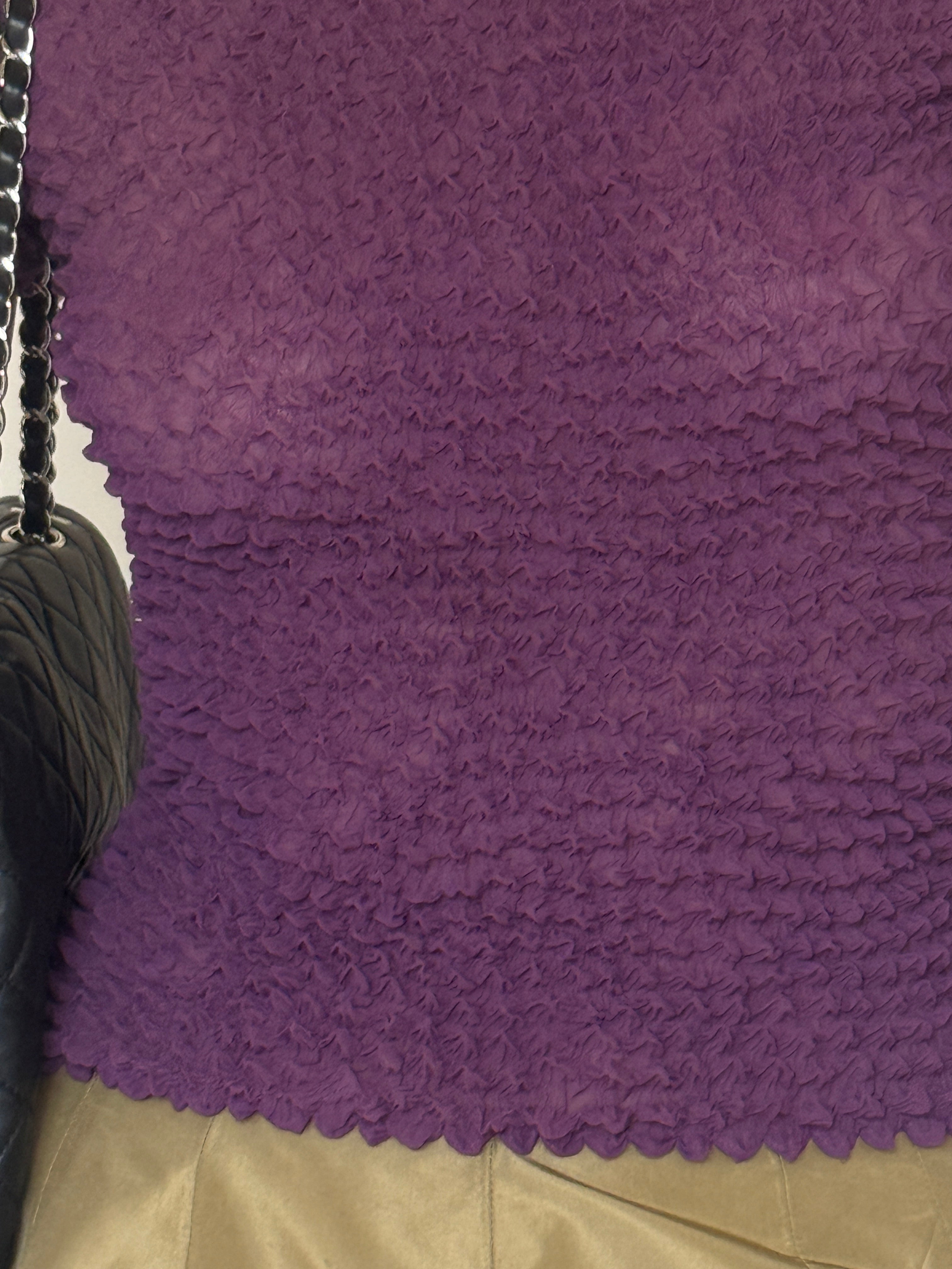 Vintage purple top textured fabric close-up