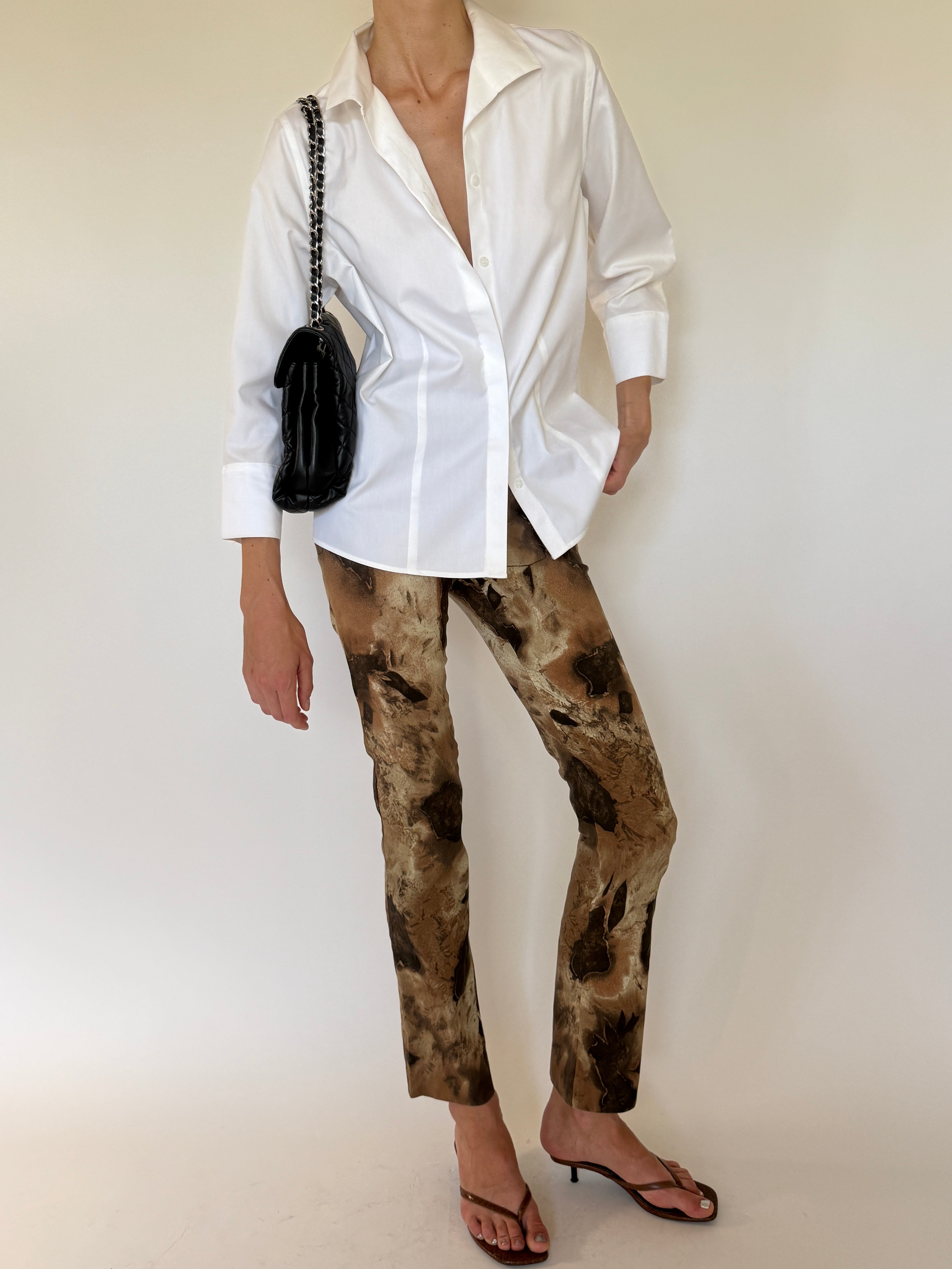 Vintage white shirt curved hem detail