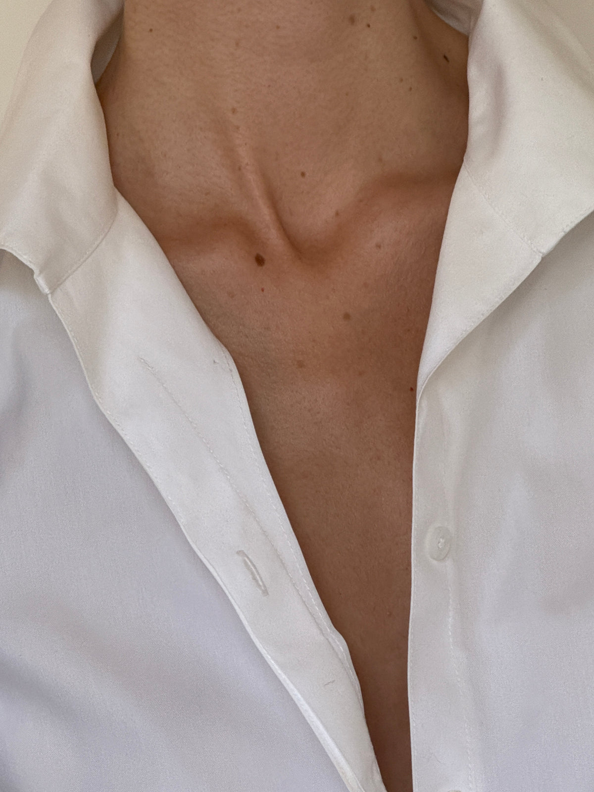 Vintage white shirt fabric close-up