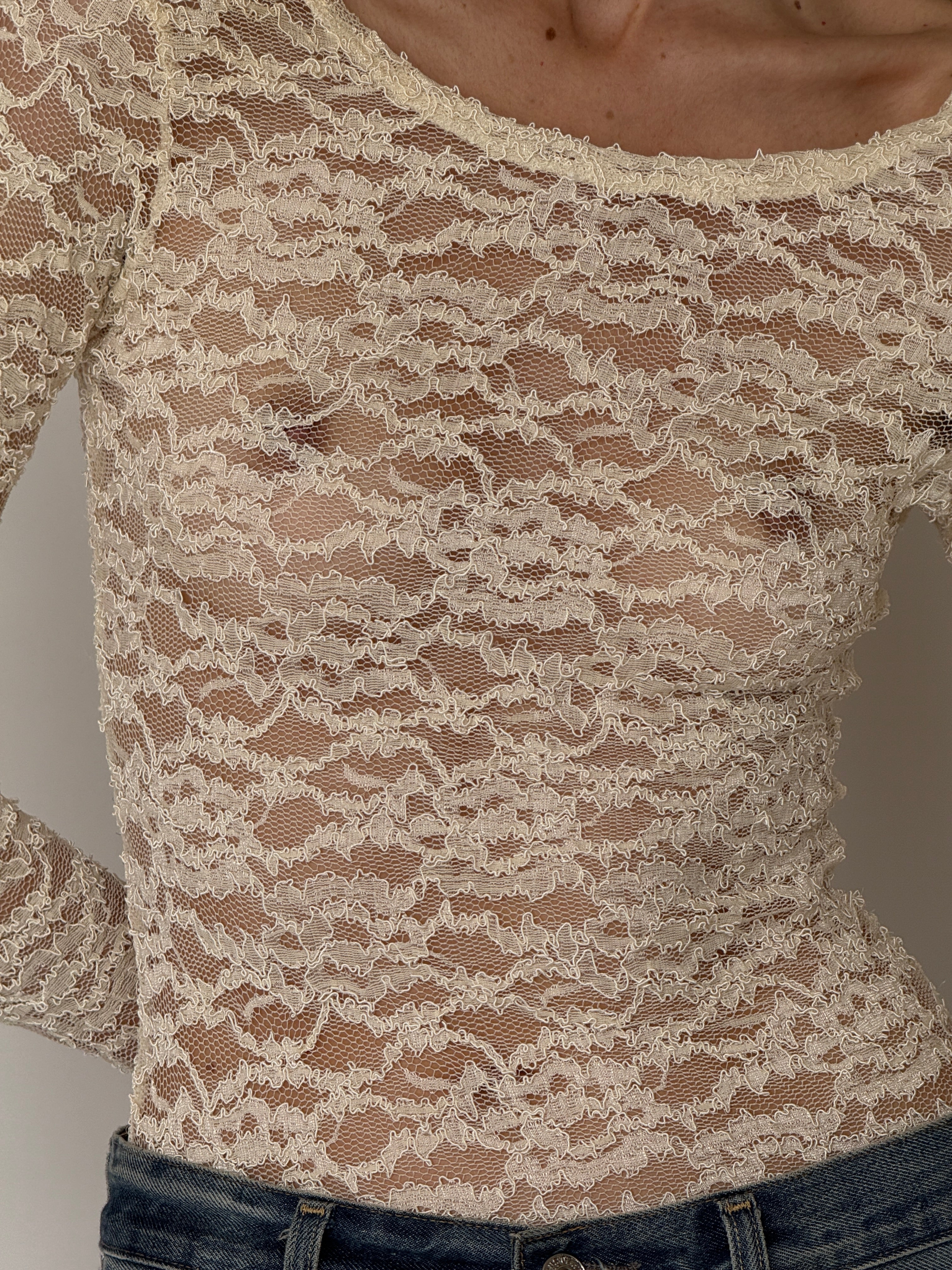 Vintage ivory lace top fabric close-up