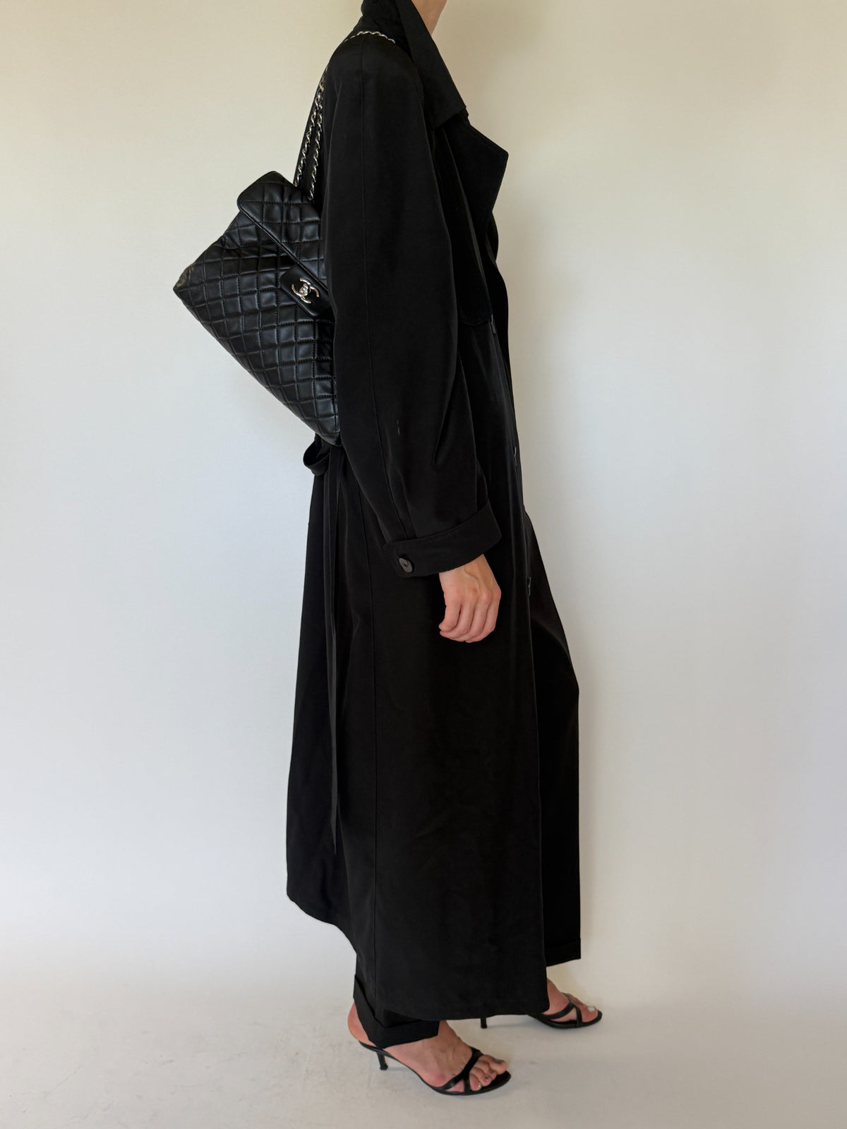 Vintage black trench coat side view