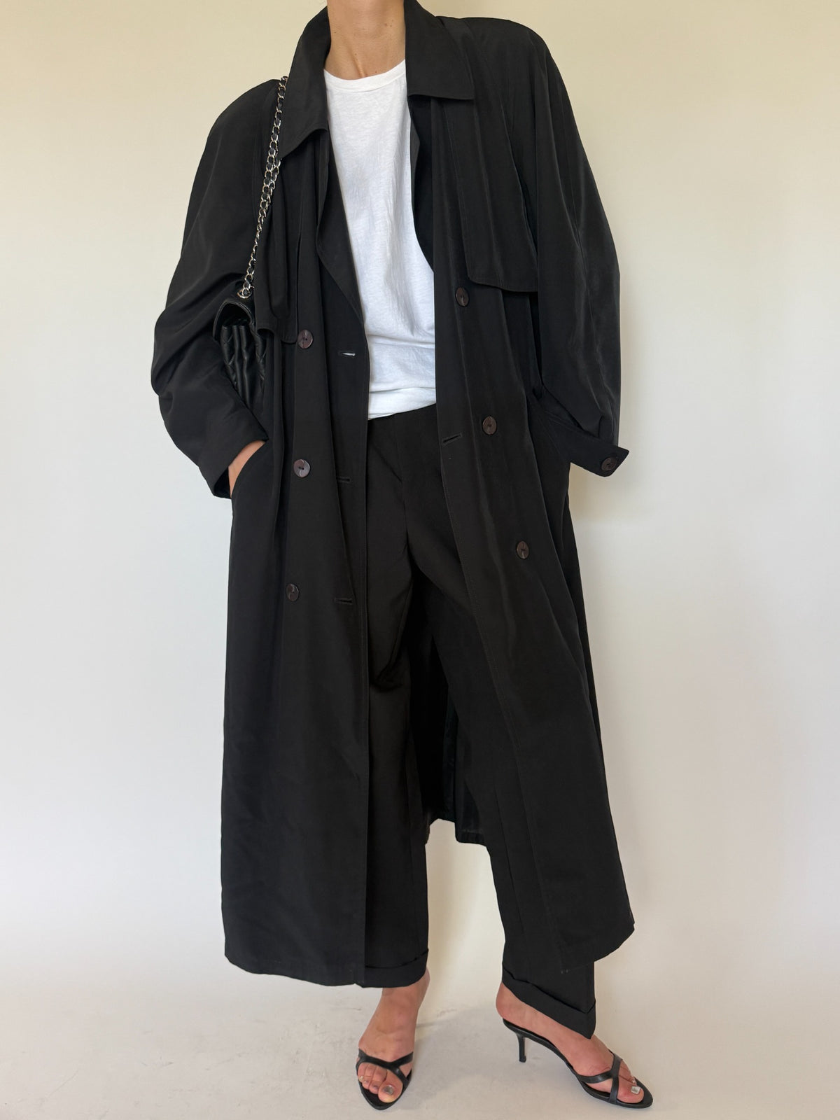 Vintage black trench coat front detail