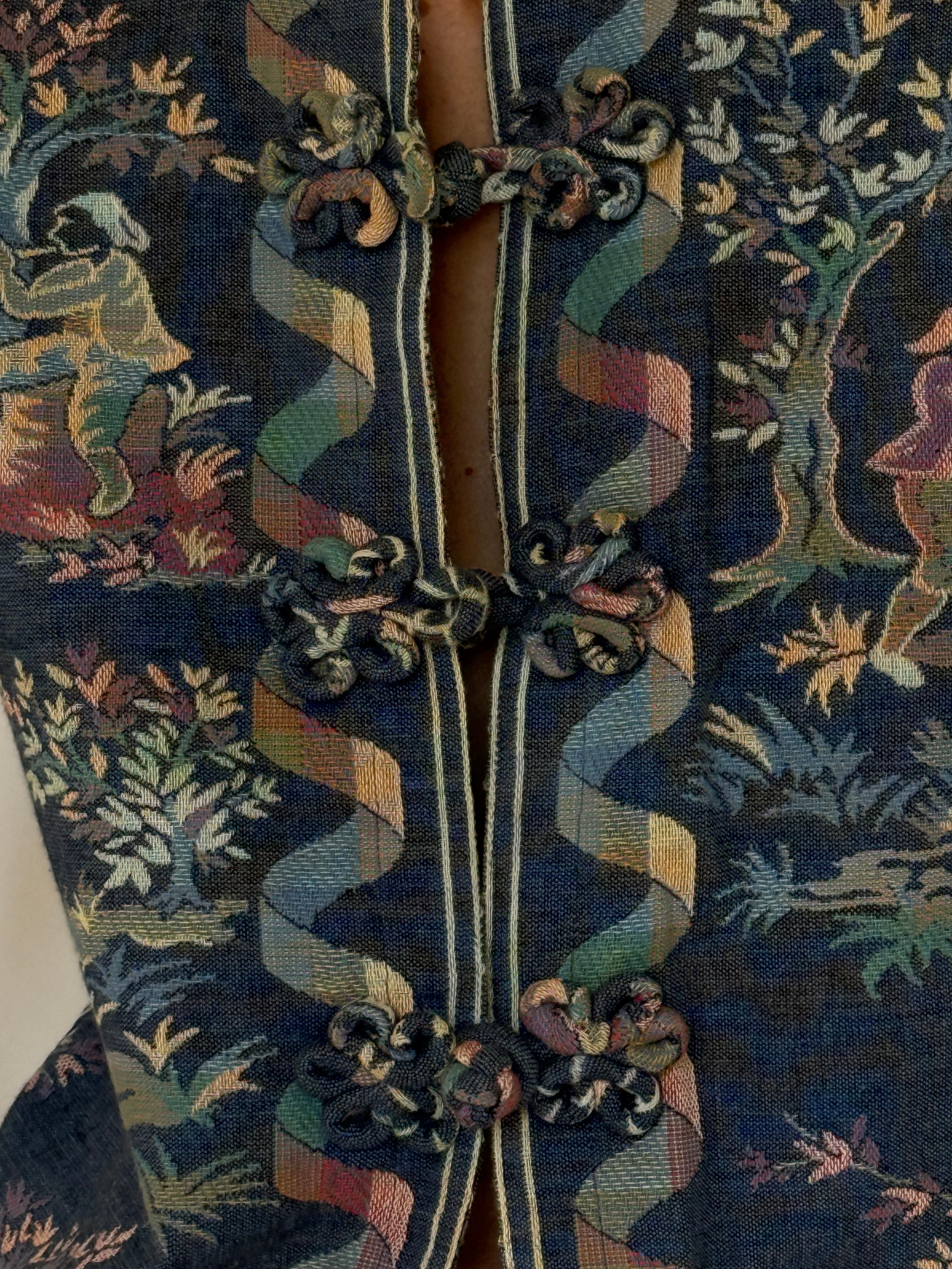 Vintage blue tapestry jacket knotted closure detail