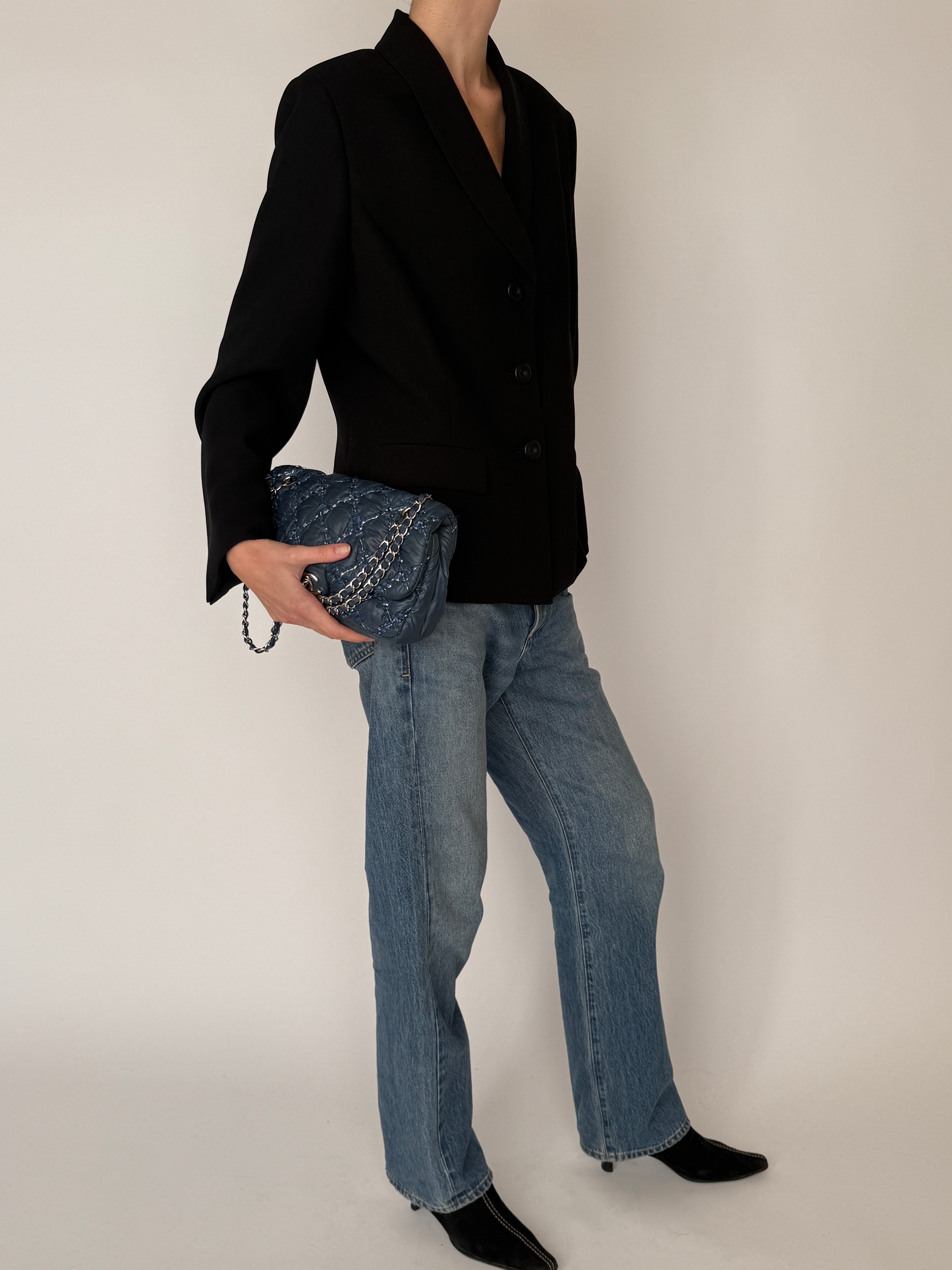 Vintage black blazer side profile view