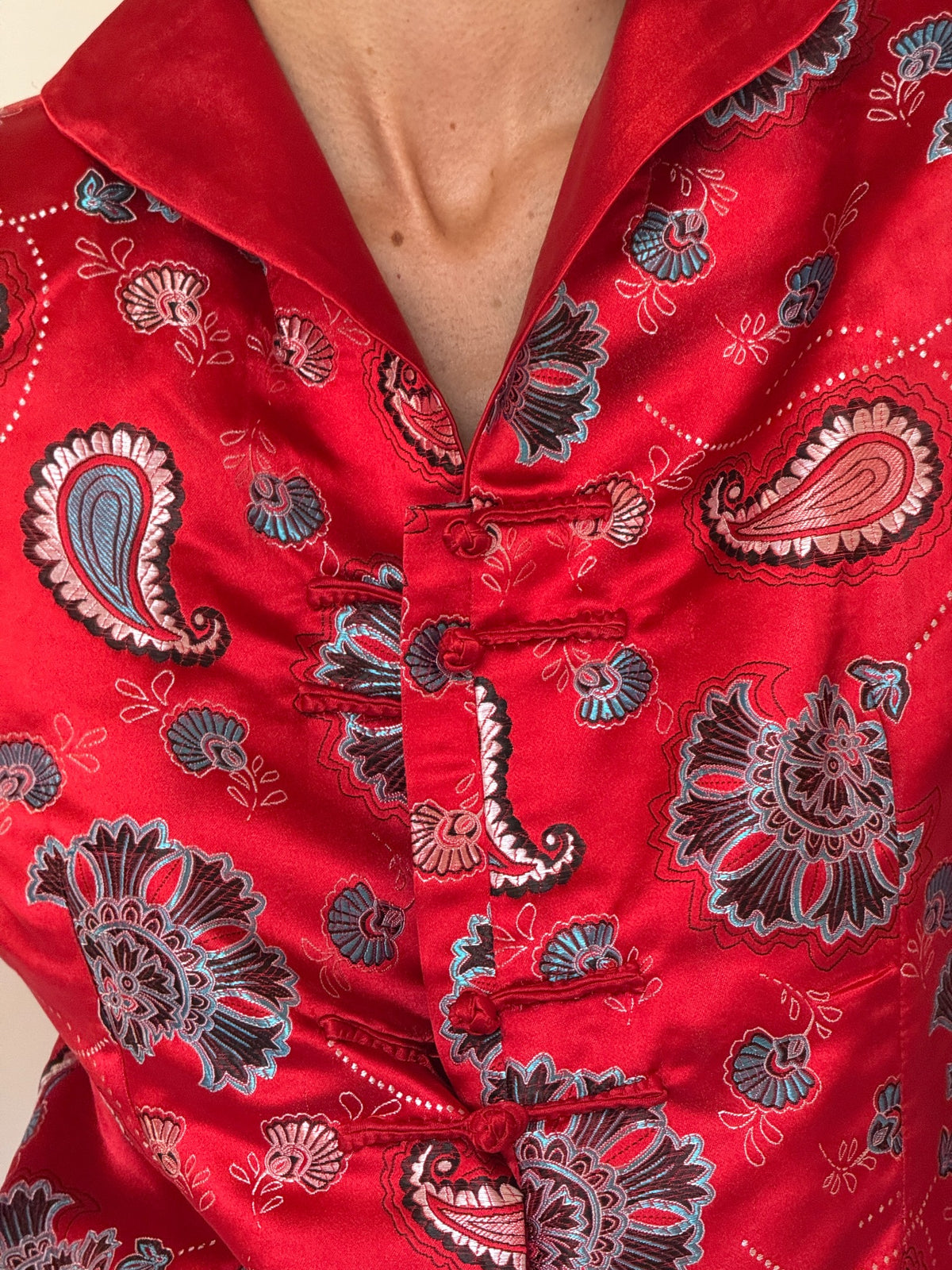 Vintage red satin paisley jacket neckline and closure detail