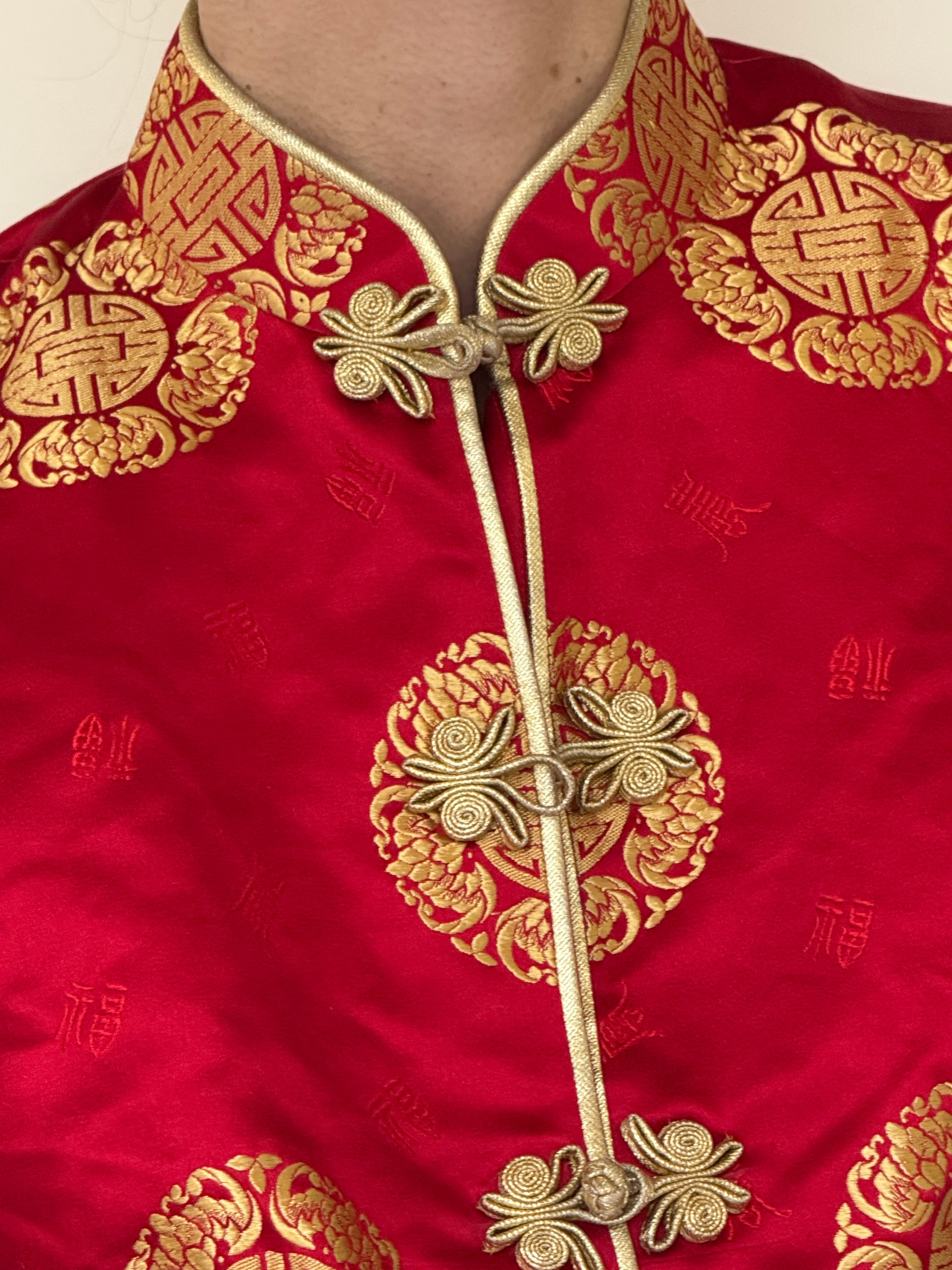 Vintage red and gold brocade fabric close-up