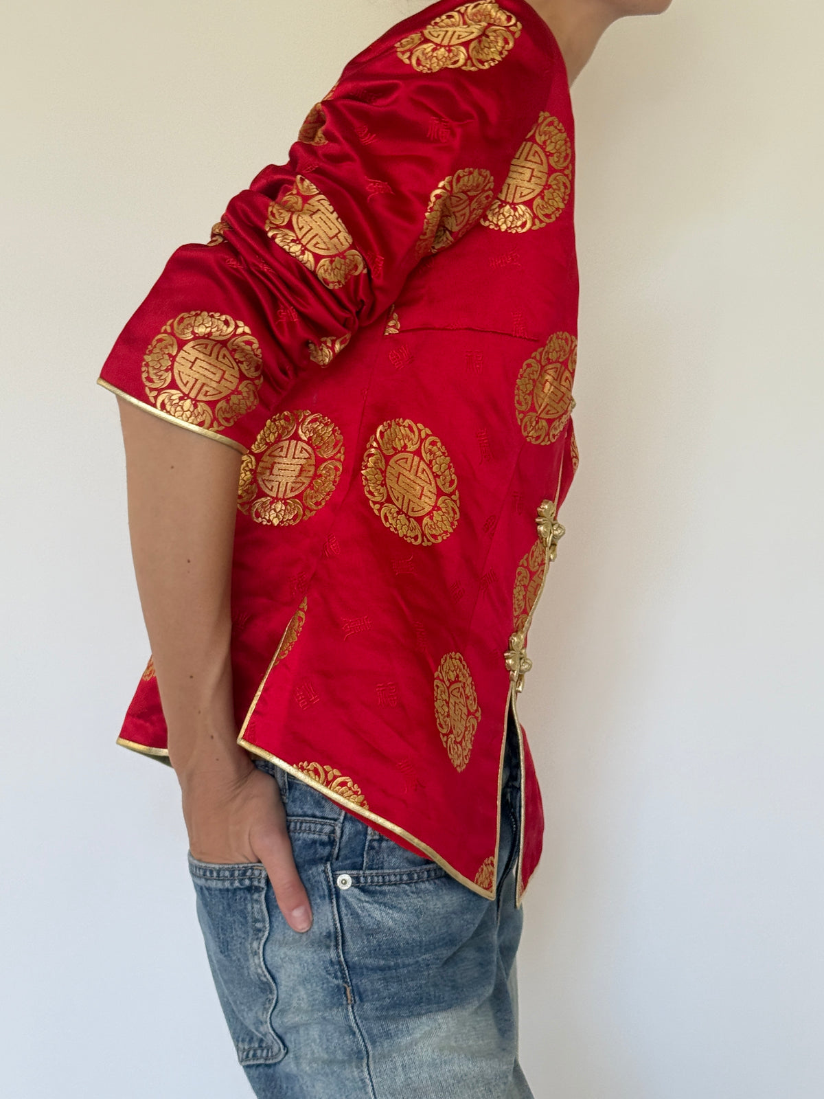 Vintage red brocade jacket side view