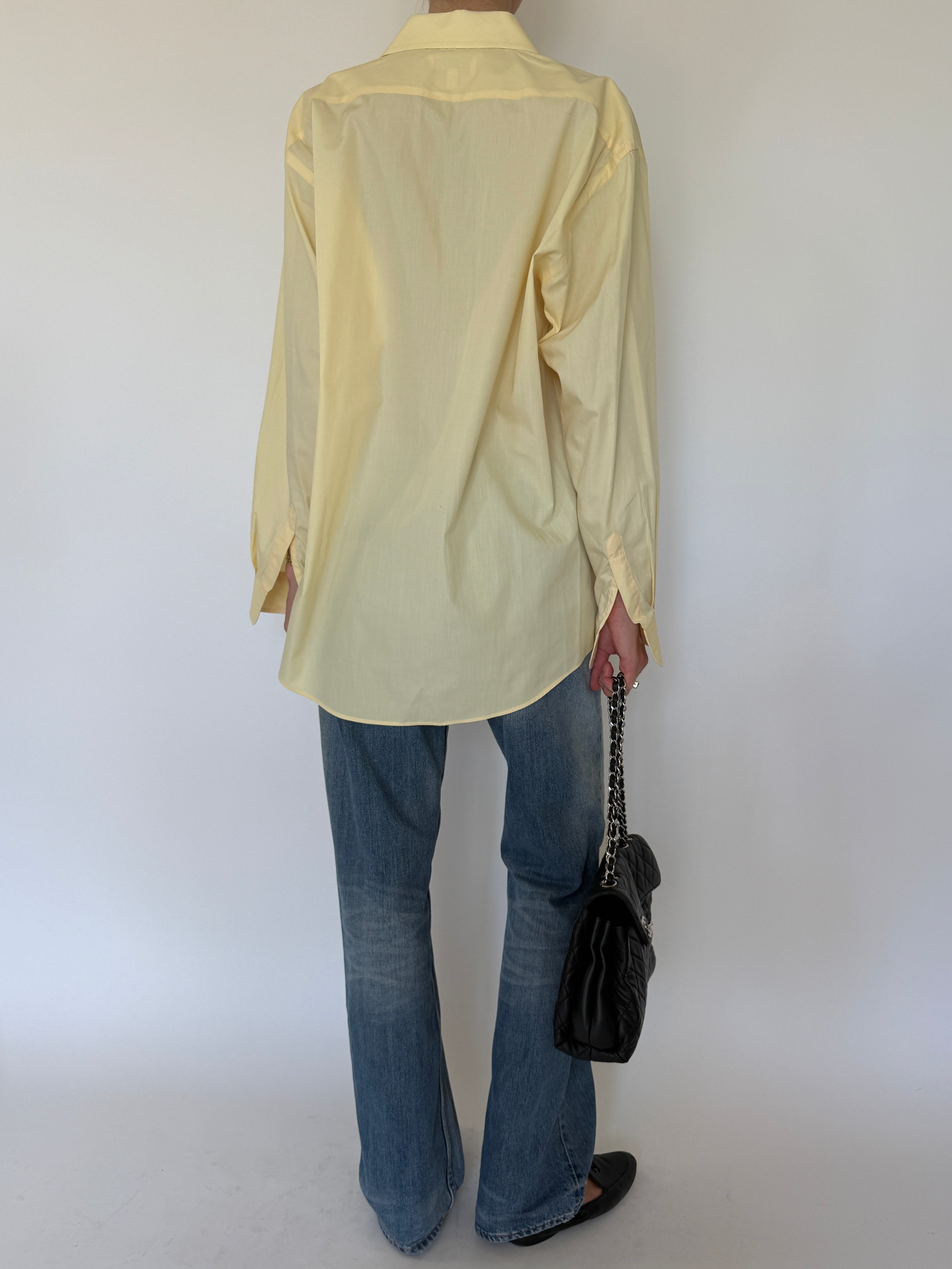 Vintage butter yellow oversized button-up shirt back view