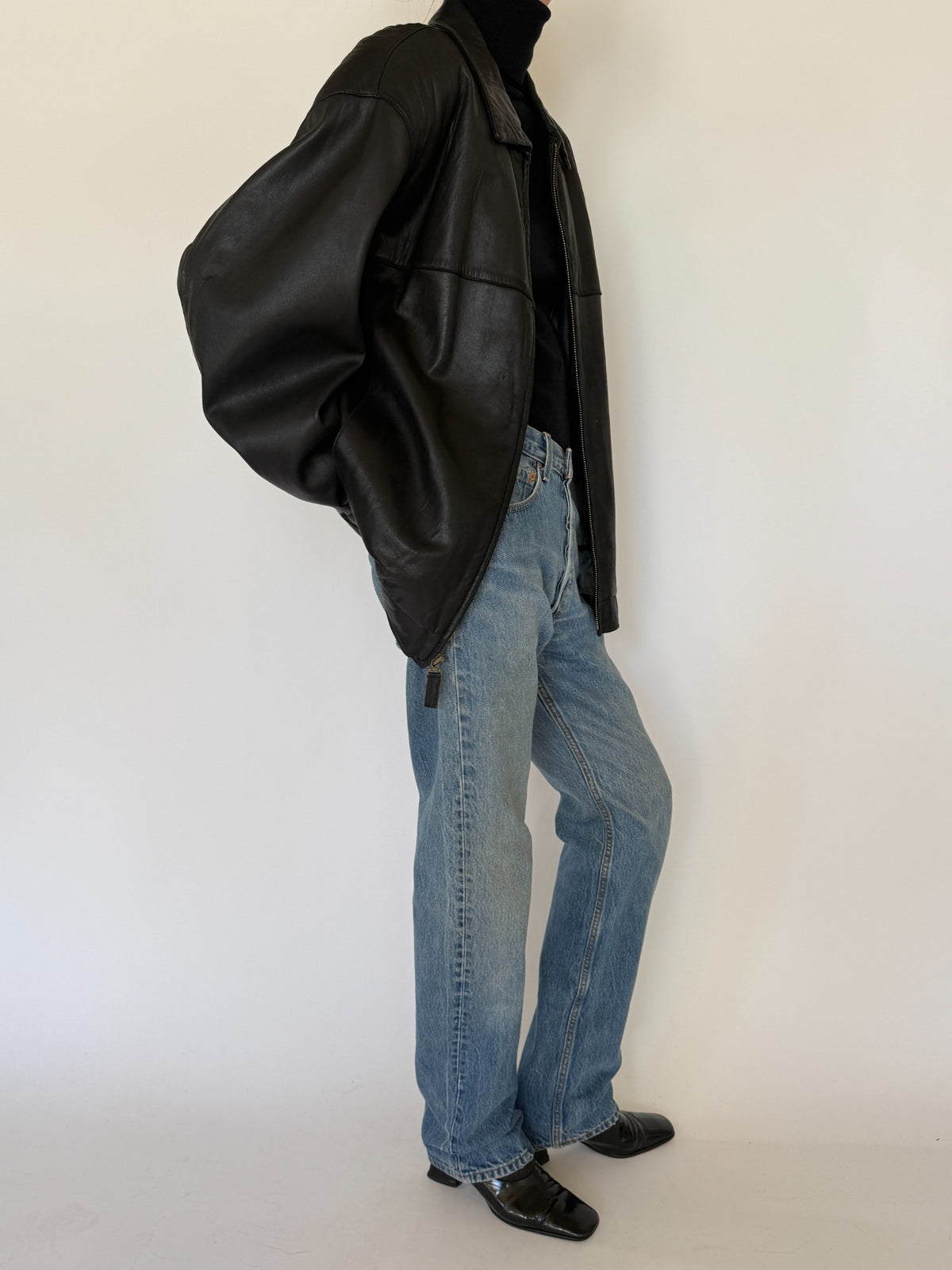 Vintage oversized black leather zip-up jacket