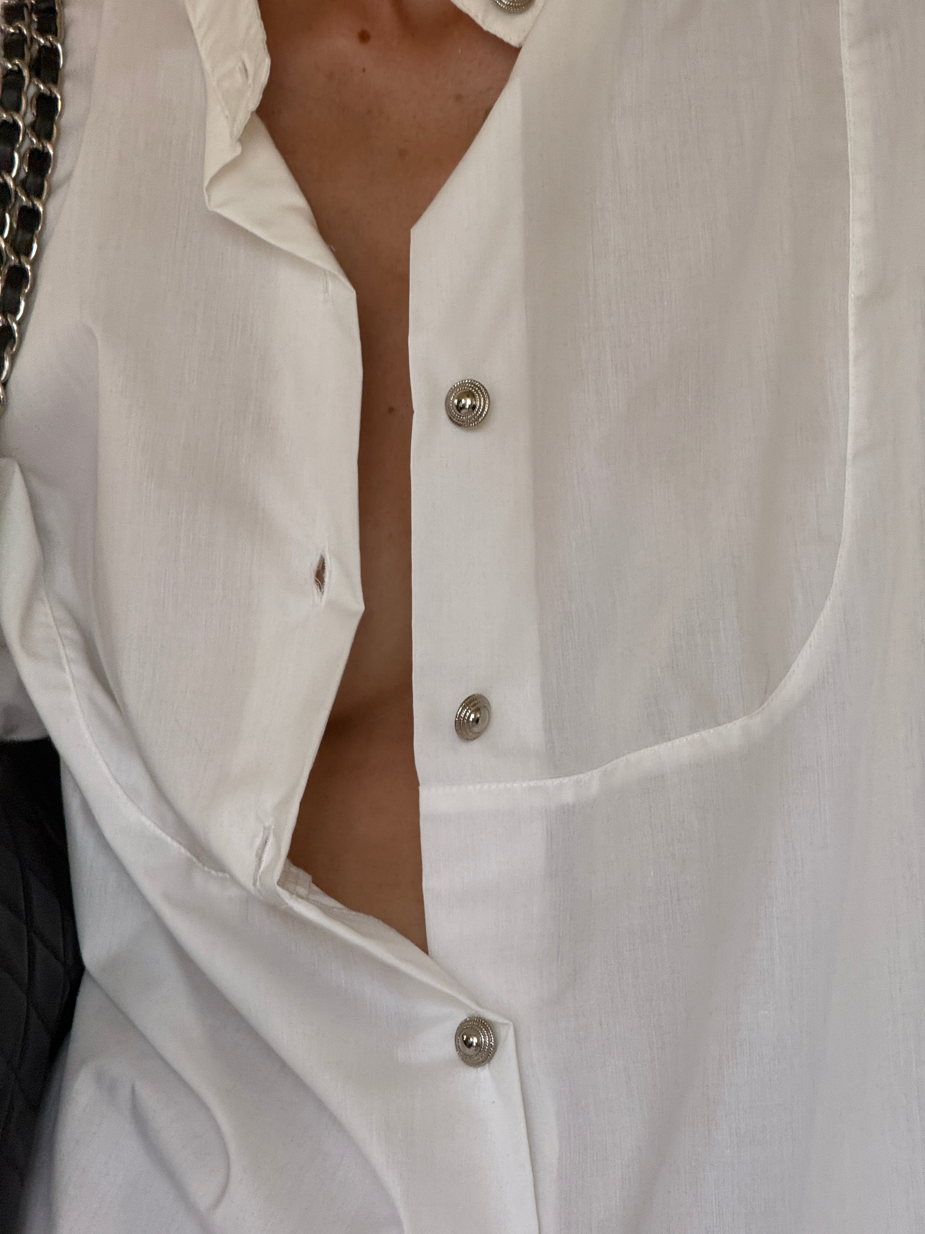 Vintage white shirt lightweight cotton-blend fabric close-up