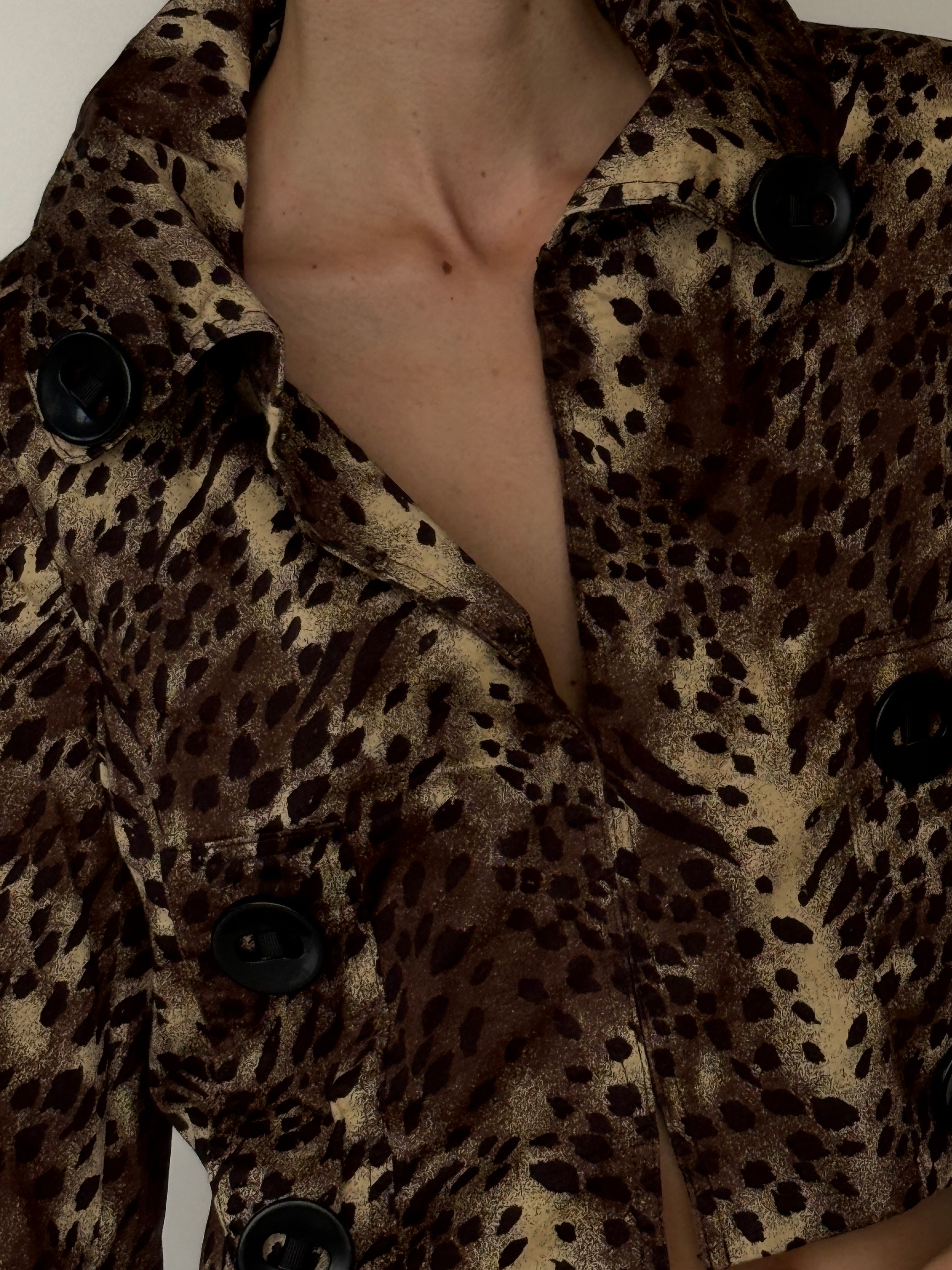 Vintage cropped leopard jacket featuring textured fabric and tailored fit in brown details