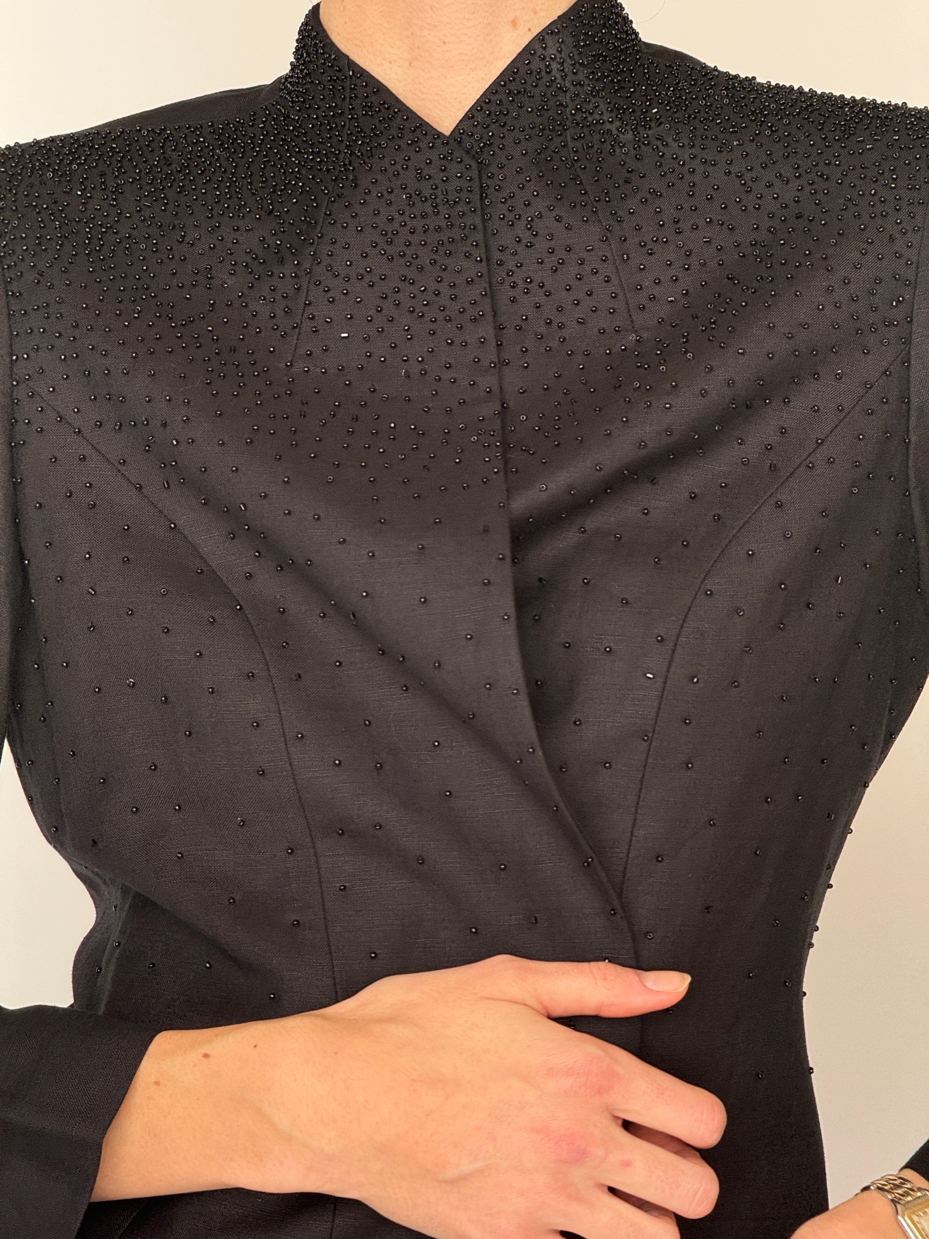 Vintage black beaded linen blend jacket fabric close-up tonal bead detail
