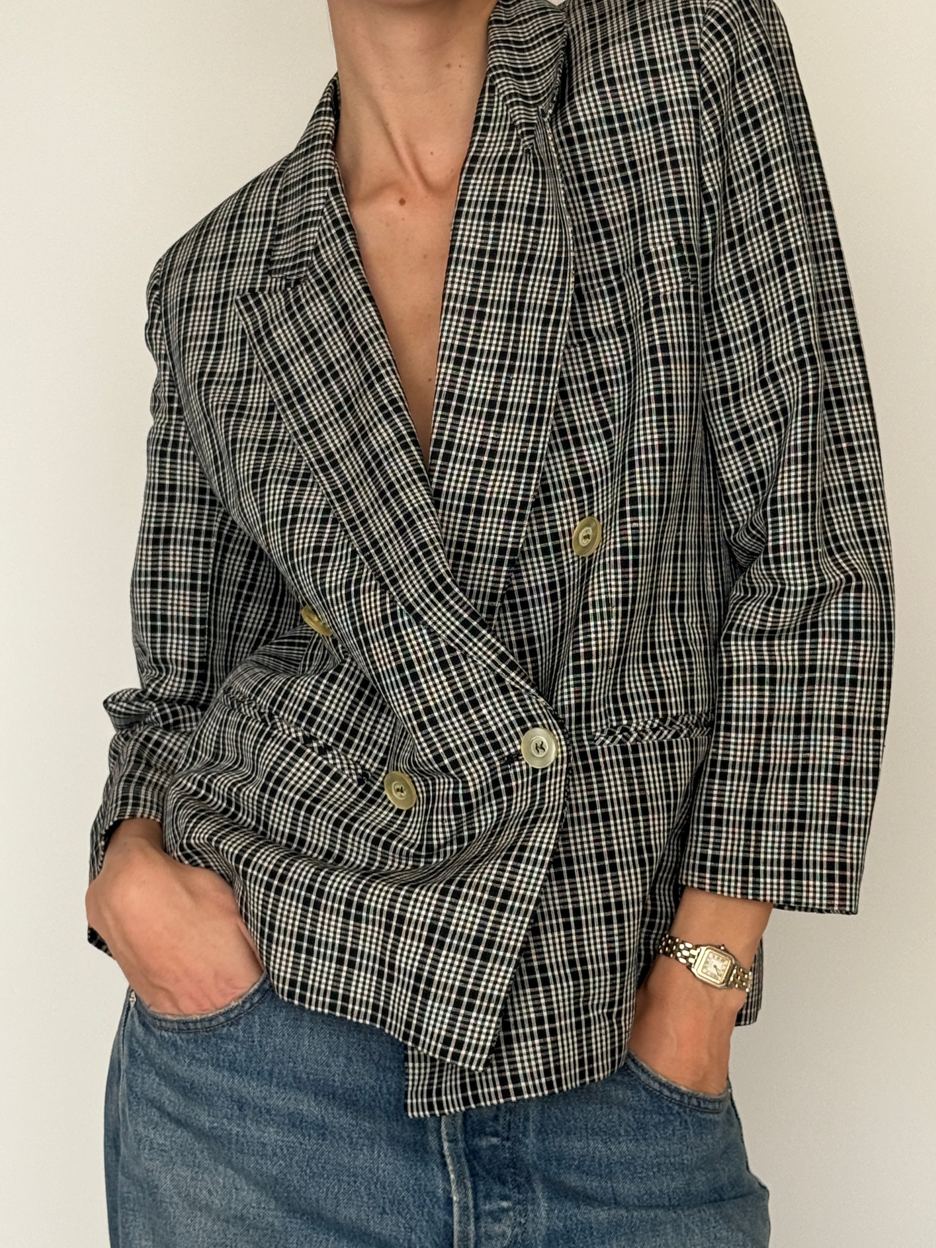 Vintage black ivory plaid blazer fabric close-up check pattern