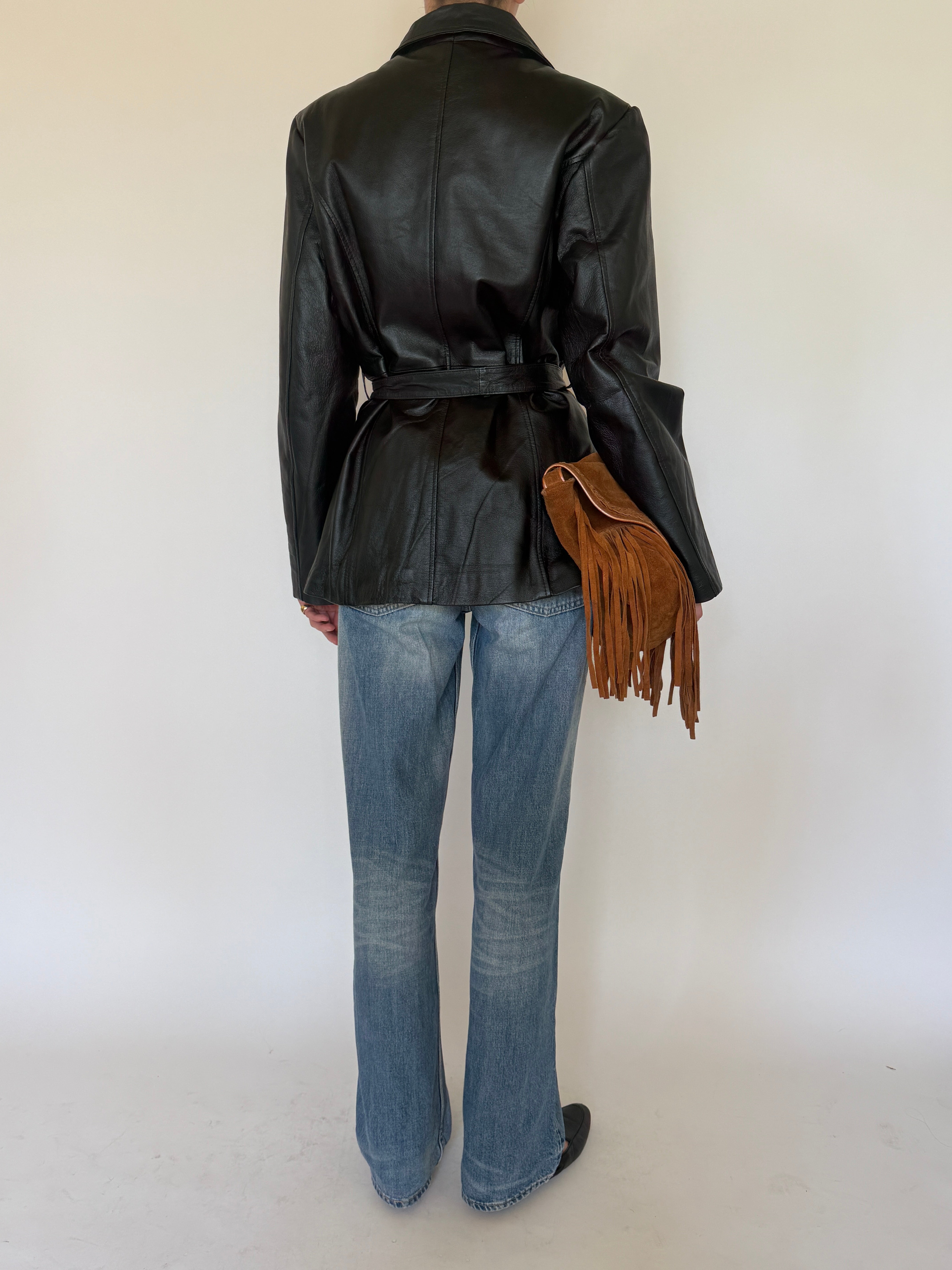 Vintage black belted leather jacket back view
